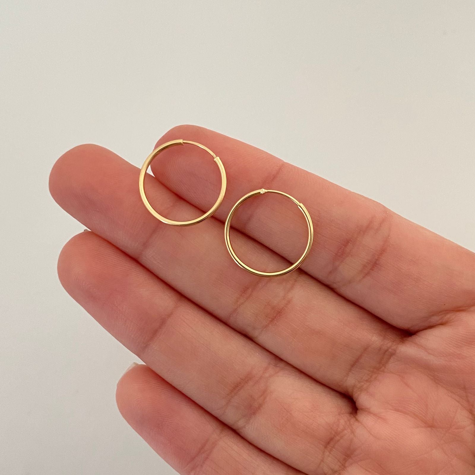 Candonga imperdible lisa Oro amarillo 18k 0,75 Gr / 1,6 Cm
