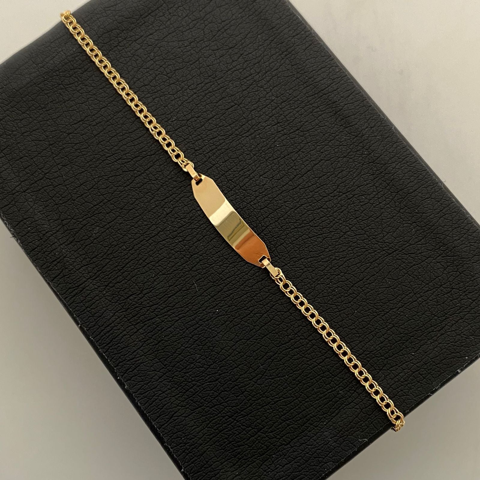 Pulso bebé Placa Rectangular Aro Seguido Oro amarillo 18k 1,40 Gr / 0,09 mm / 15,5 Cm Broche 0,15