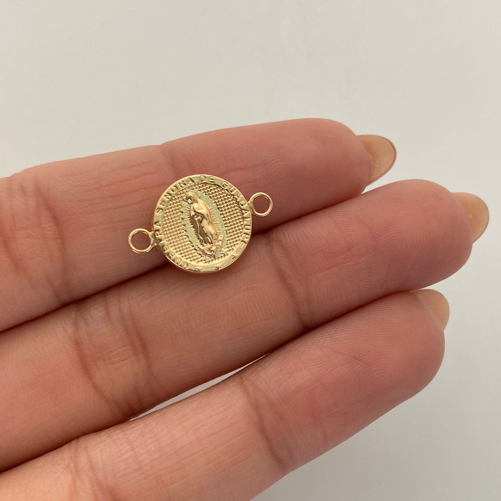 Herraje Guadalupe Redonda Oro amarillo 18k 0,75 Gr / 1,2 Cm