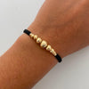 Pulsera tejida Bolas Diamantadas 8,6,5,4,3 mm negro Oro amarillo 18k 0,85 Gr