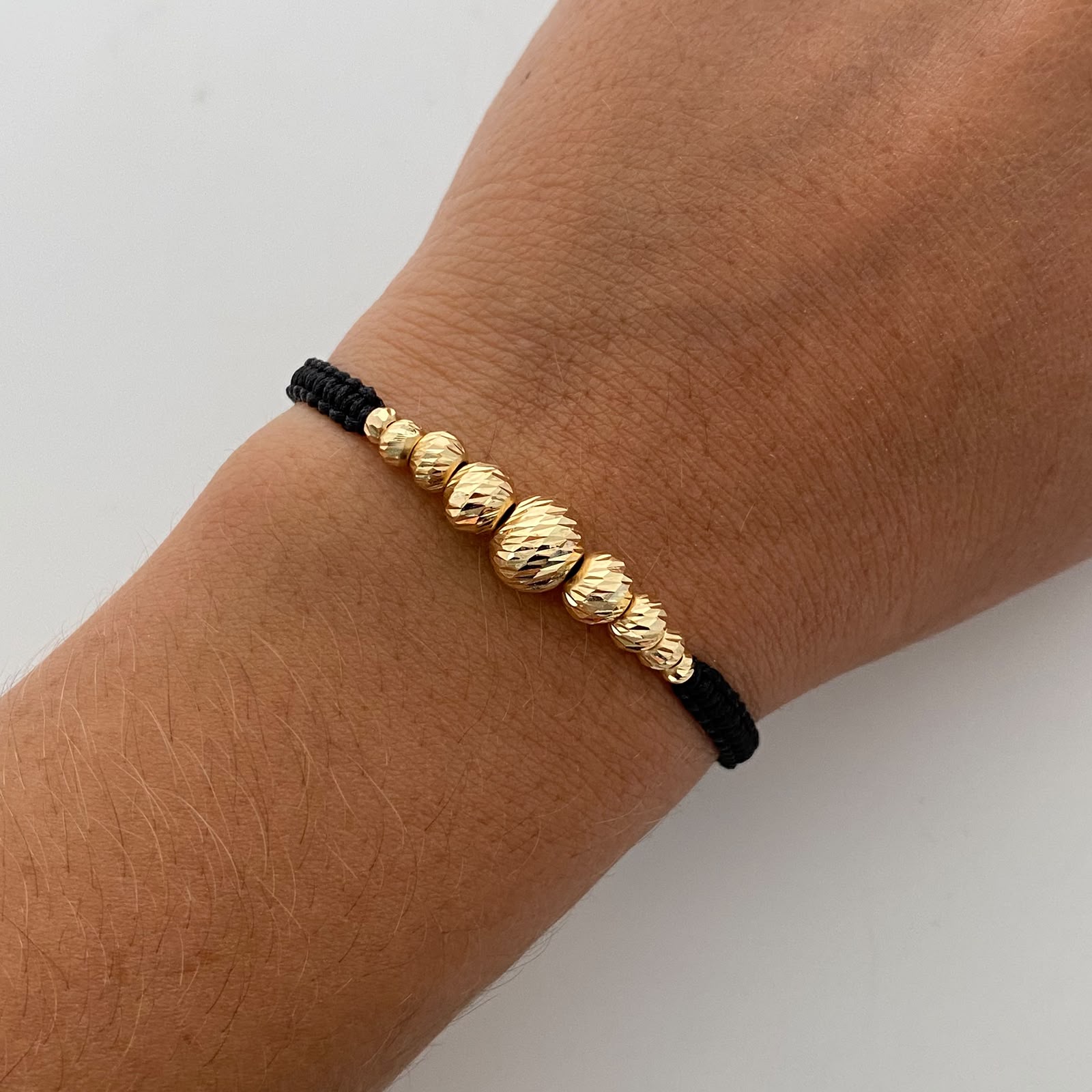 Pulsera tejida Bolas Diamantadas 8,6,5,4,3 mm negro Oro amarillo 18k 0,85 Gr