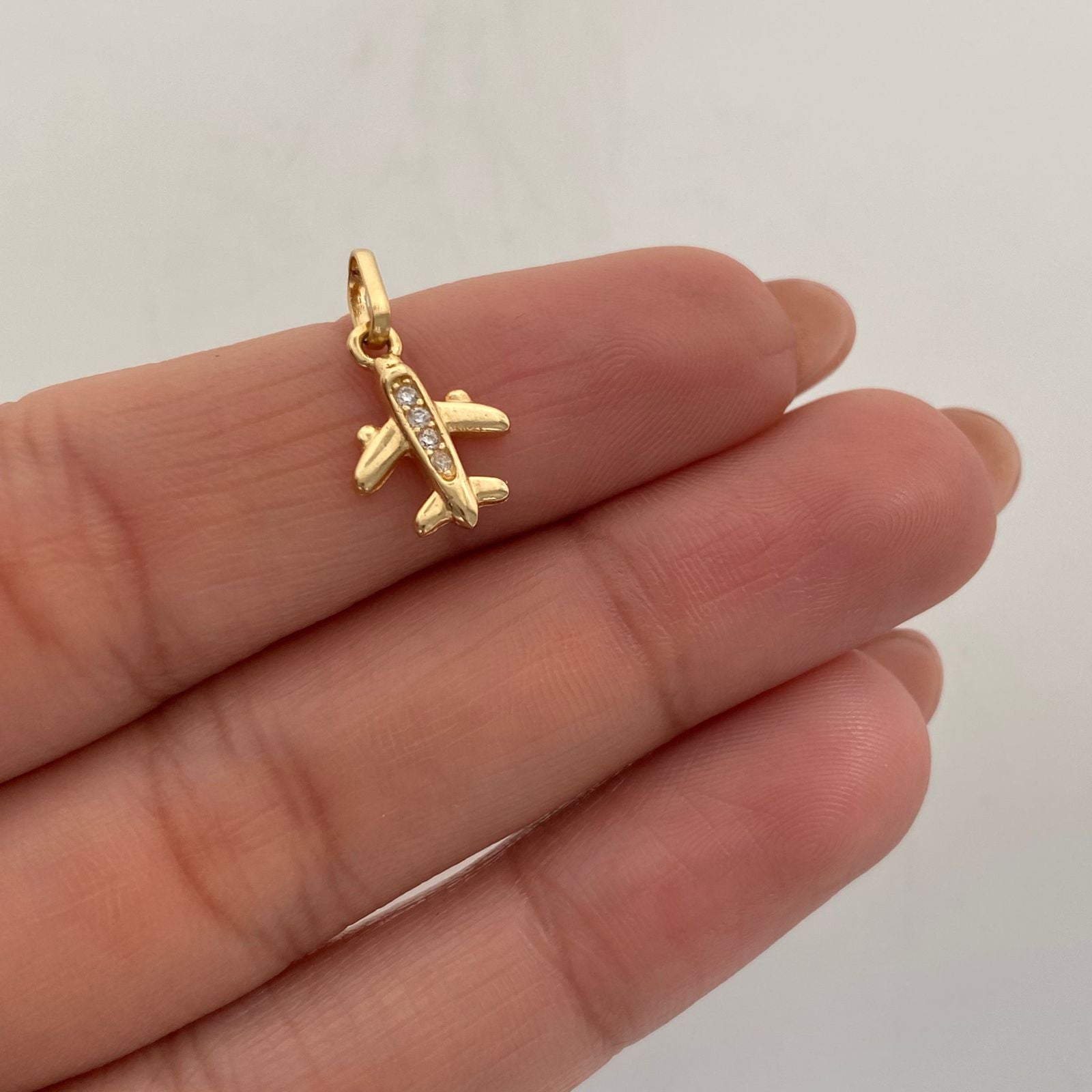 Dije Avion Casting Oro amarillo 18k 0,9 Gr / 9,4 mm / 1,9 Cm