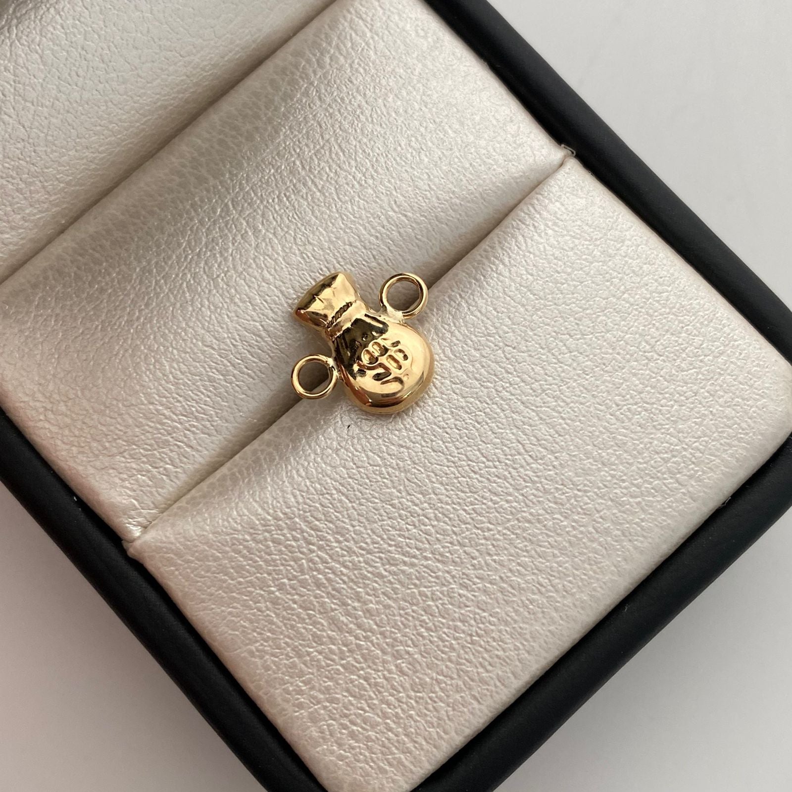 Herraje Bolsa de Valores Oro amarillo 18k 0,5 Gr / 1,3 Cm