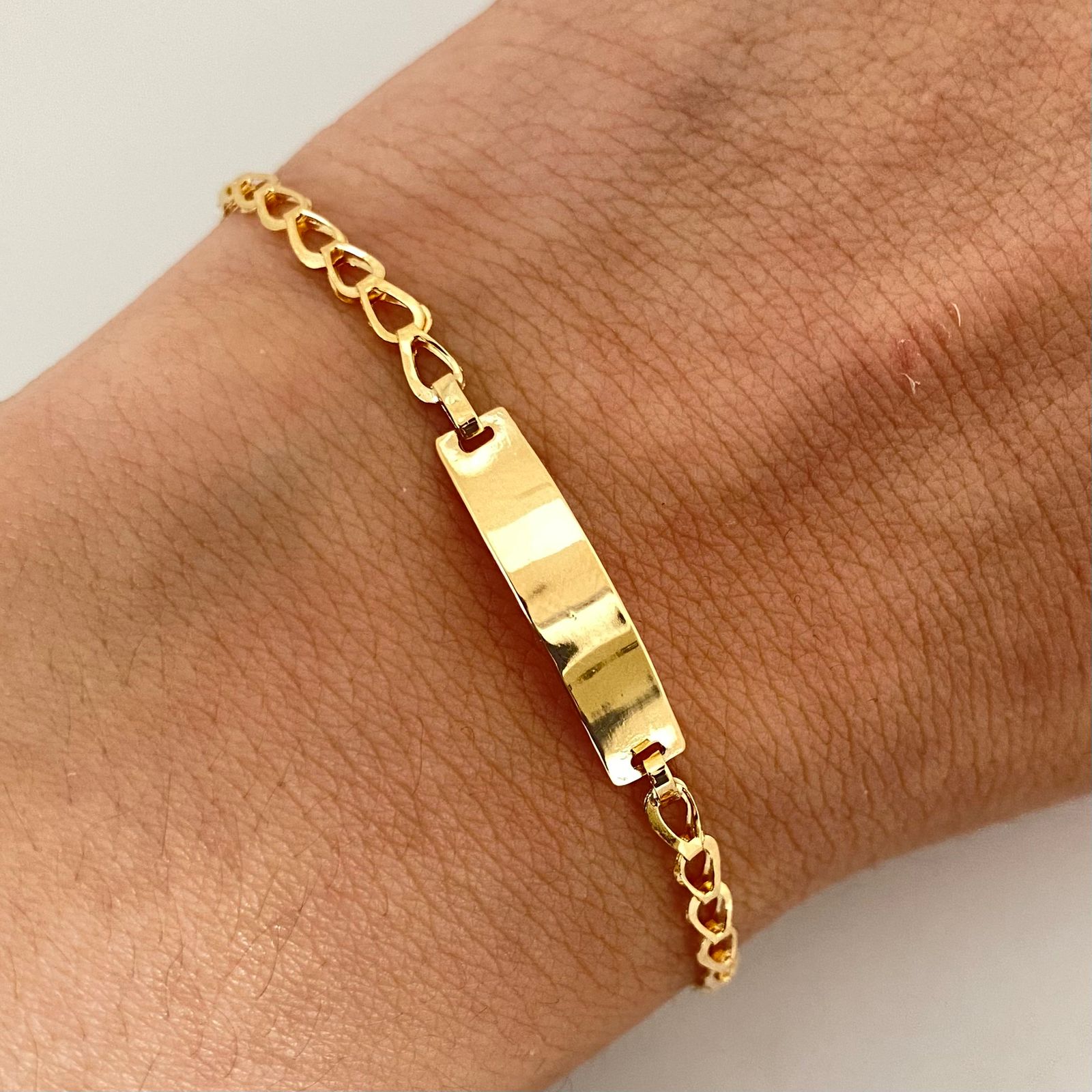 Pulso bebé con herraje placa lisa  Oro amarillo 18k 1,30 Gr / 15,5 Cm  Broche 0,15