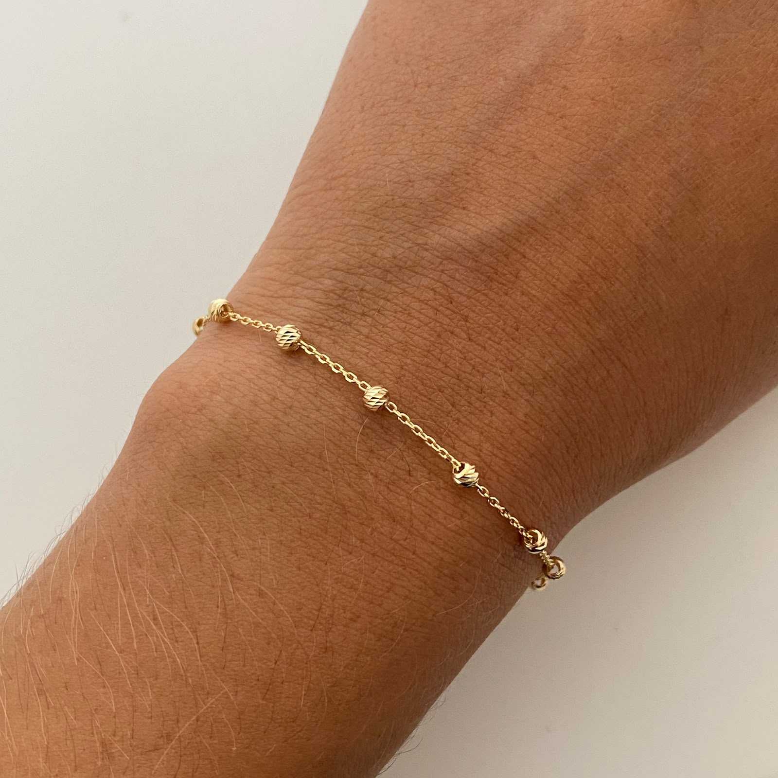 Pulso It Mini Rollon bolas diamantadas 3mm Oro amarillo 18k +4 / 1,55 Gr / 0,7 mm / 19 Cm