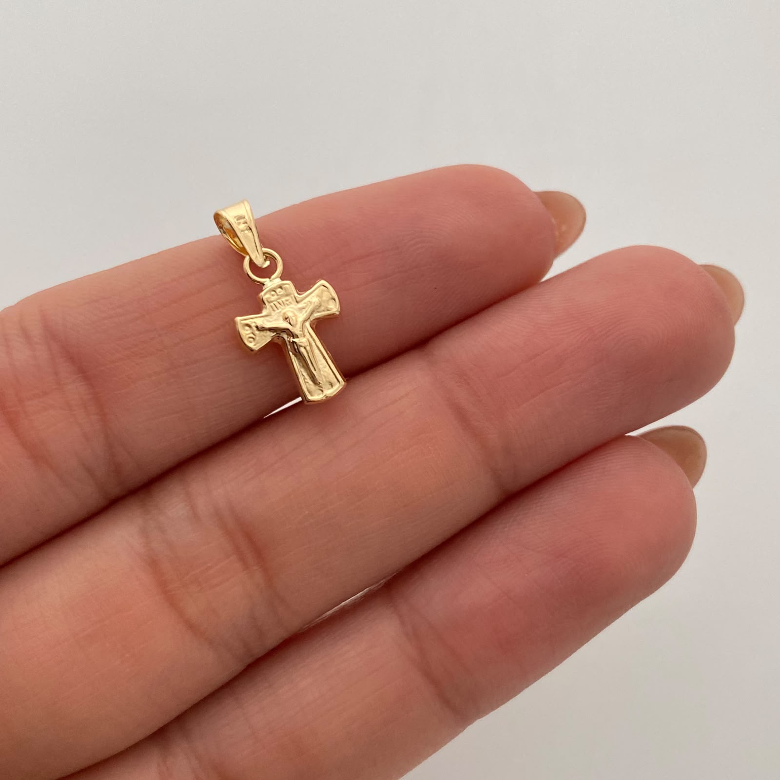 Dije Cruz Cristo Oro amarillo 18k 0,4 Gr / 8,7 mm / 1,7 Cm