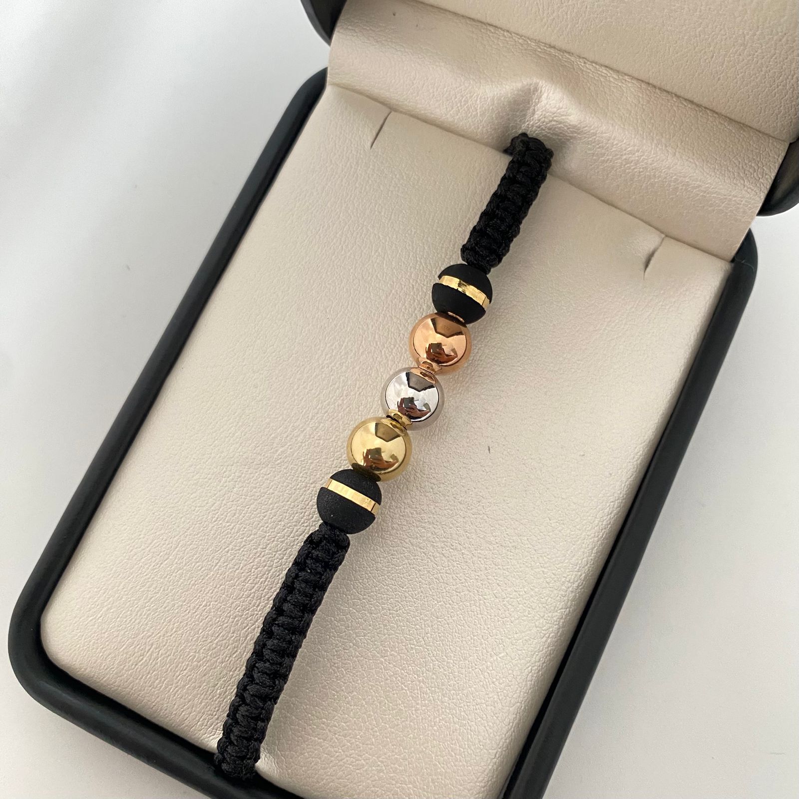 Pulsera tejida balines lisos #8 y neoros 1 raya #8 Tres oros 18k 1,15 Gr