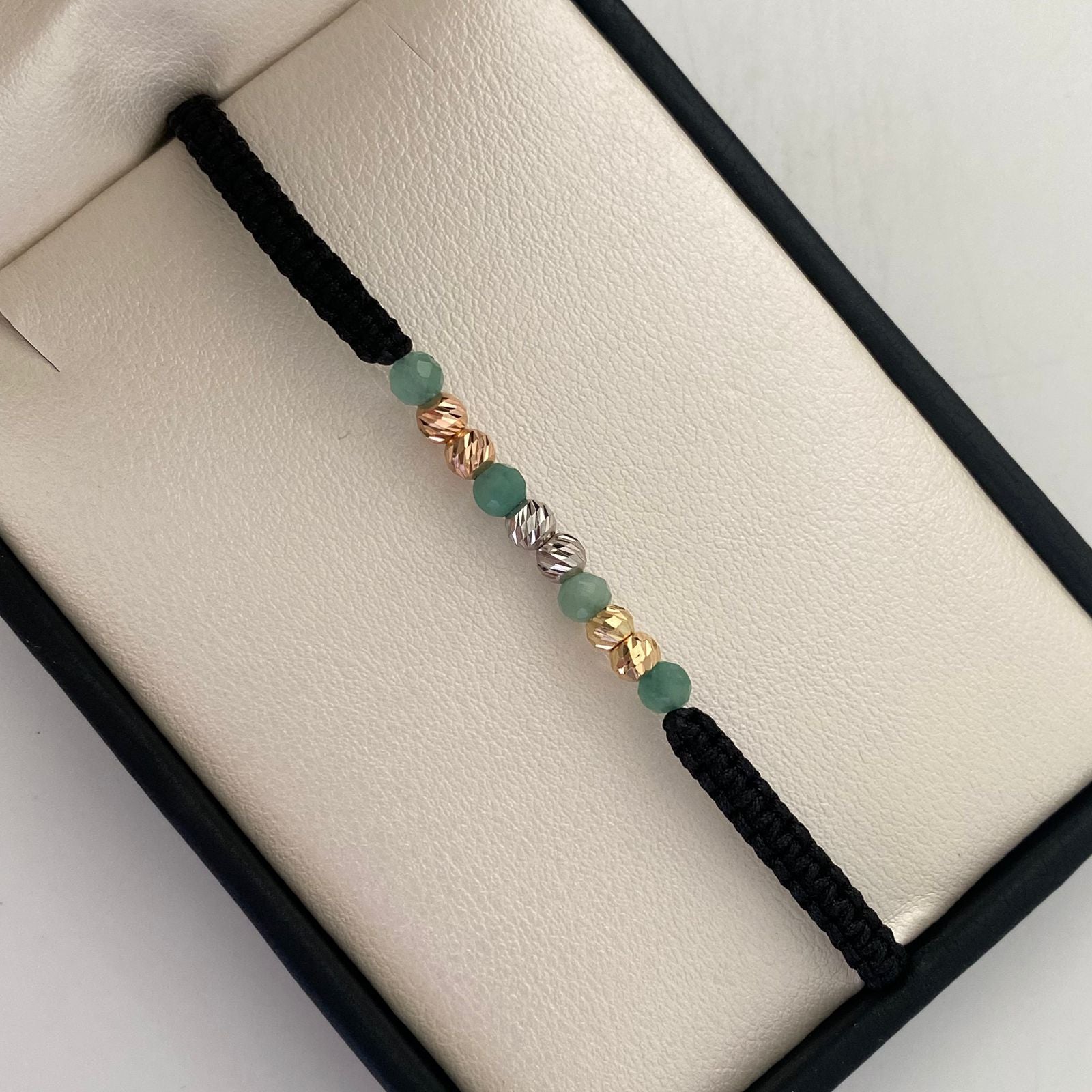 Pulsera tejida Bola diamantada 4mm +morrallas Tres oros 18k 0,55 Gr