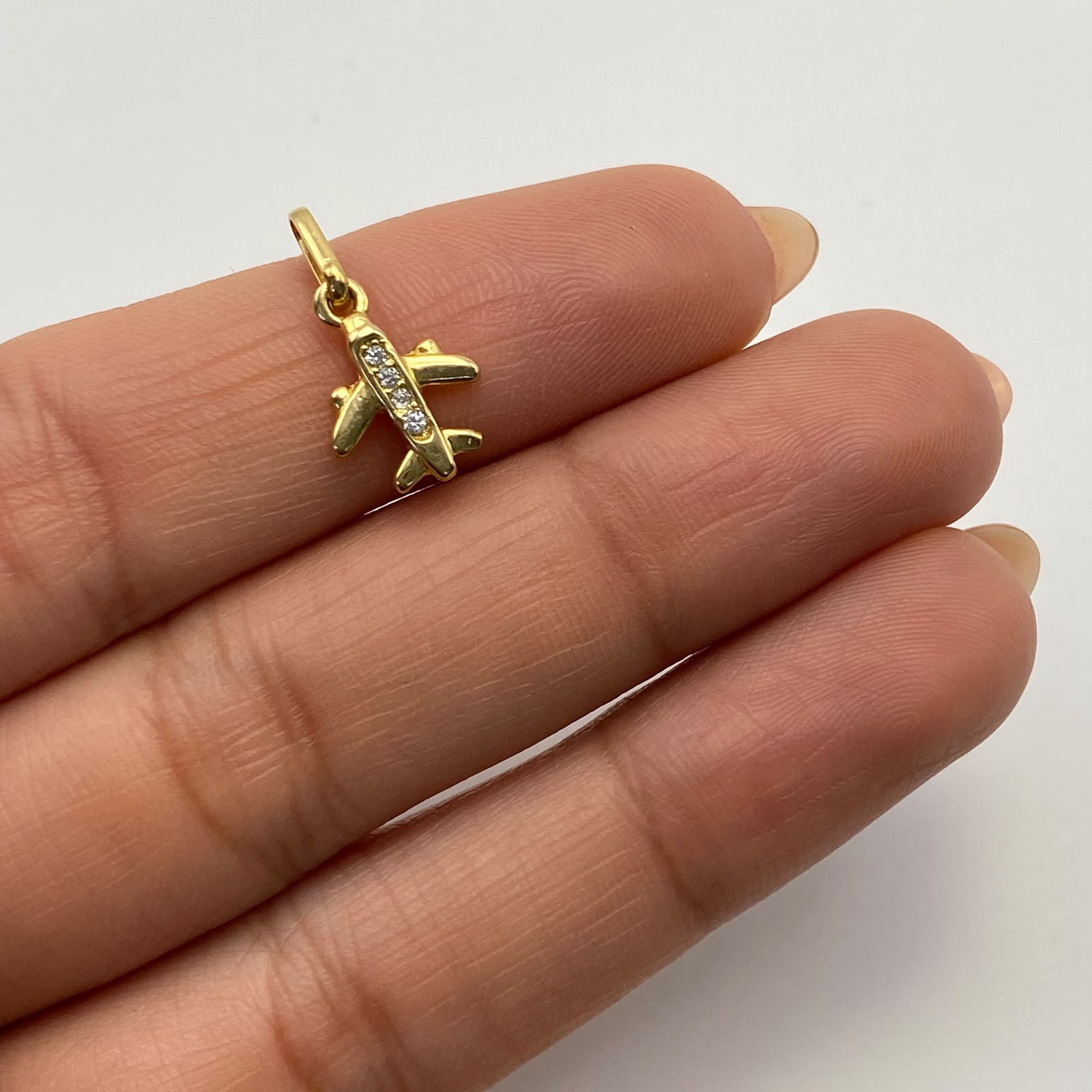 Dije Avioncito Casting blanco Oro amarillo 18k 0,95 Gr / 9,3 mm / 1,6 Cm