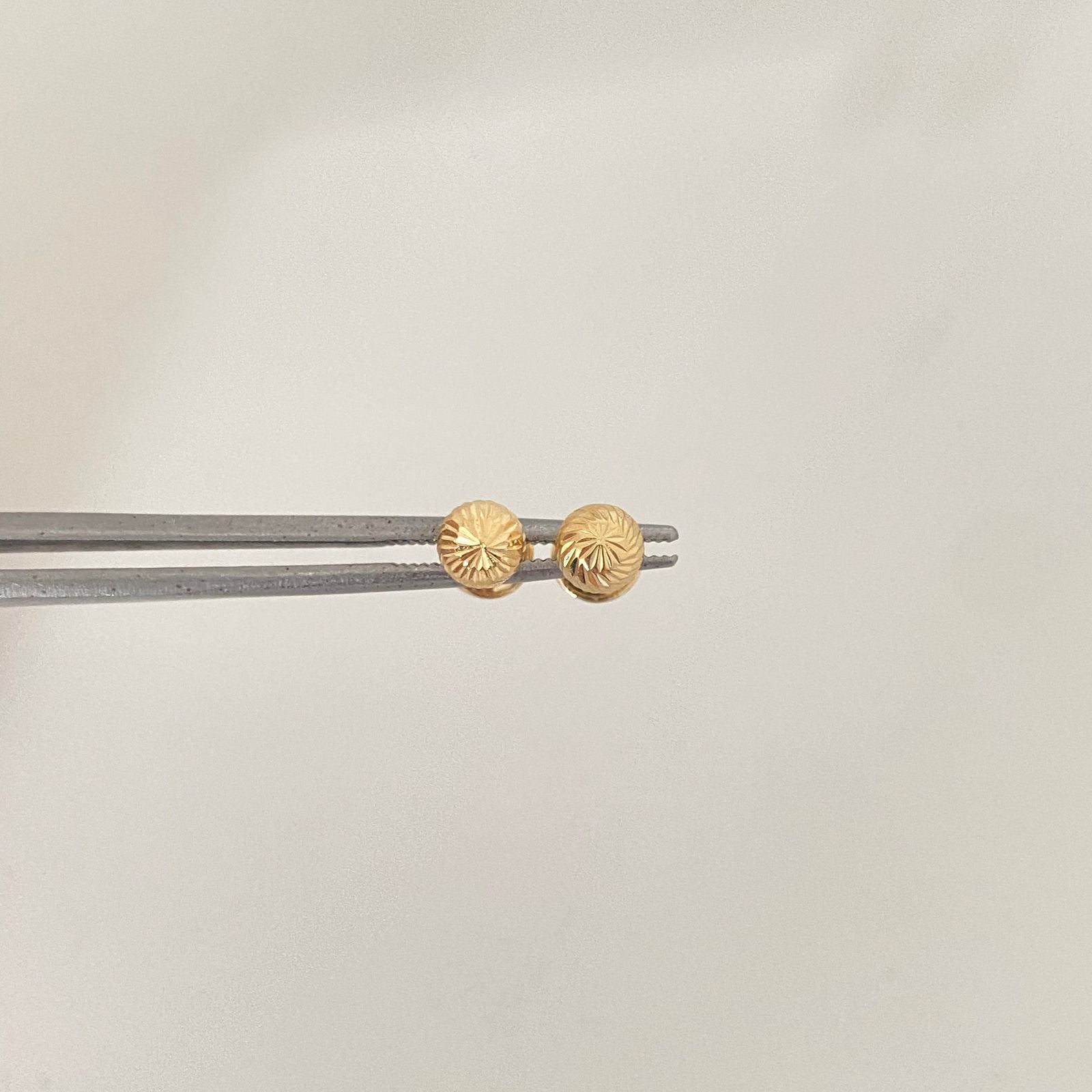 Topos bola diamantada Oro amarillo 18k 0,65 Gr / 5,0 mm