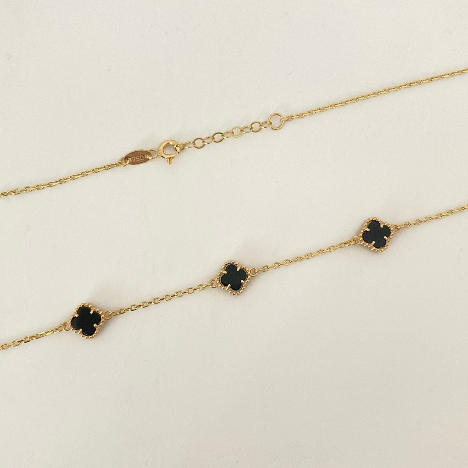 Cadena It aro seguido con trebol negro  Oro amarillo 18k +4 / 6,75 Gr / 1,2 mm / 44 Cm