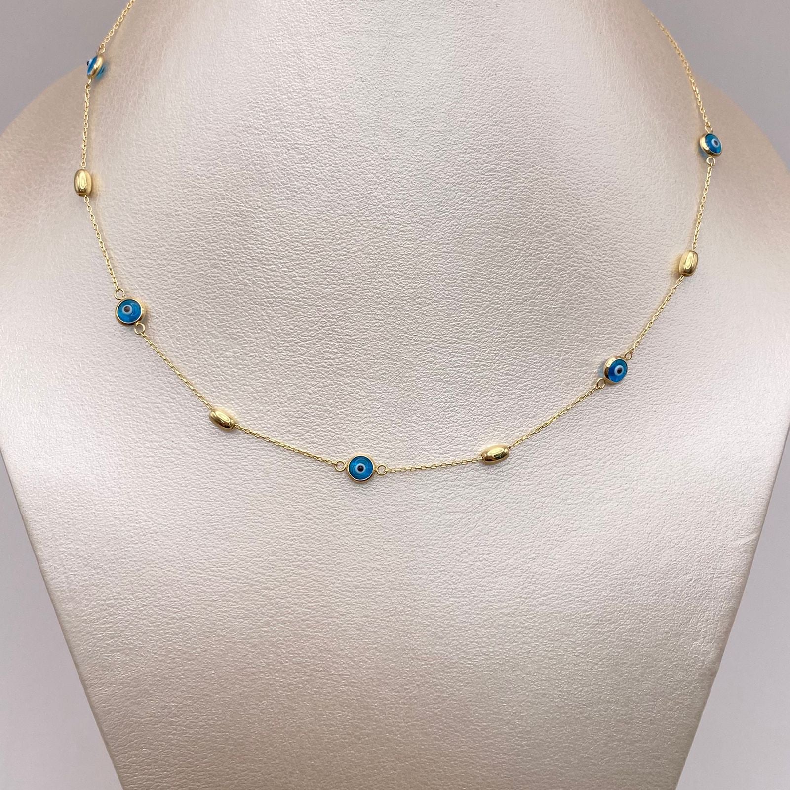 Cadena It Tejido aro seguido ojo turco Oro amarillo 18k 2,55 Gr / 0,7 mm / 45 Cm
