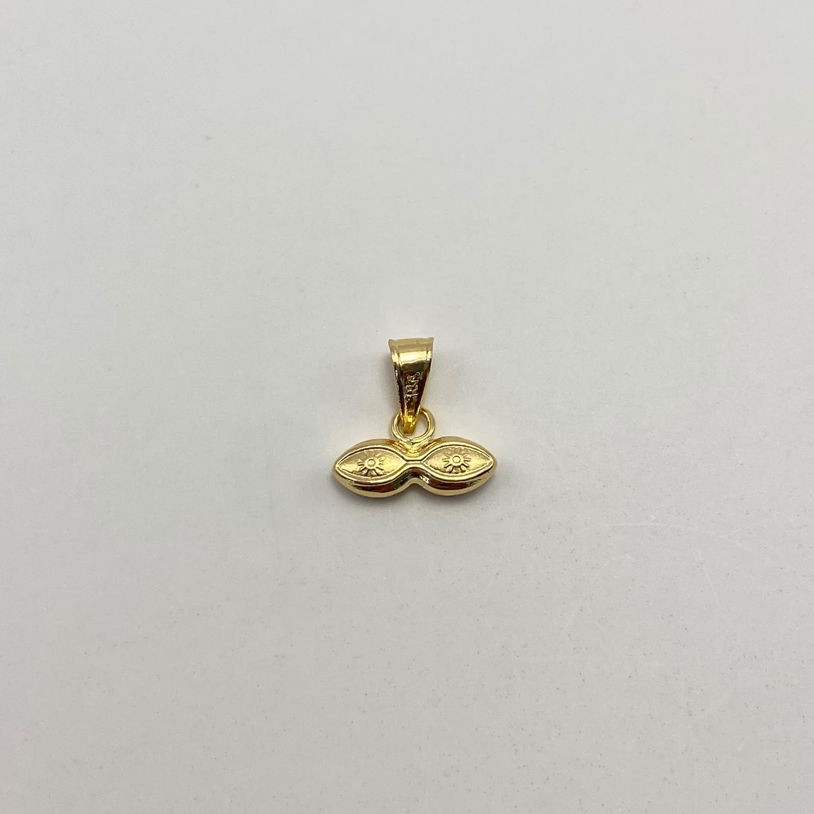 Dije Ojos de santa lucia Oro amarillo 18k 0,3 Gr / 10,8 mm / 1 Cm