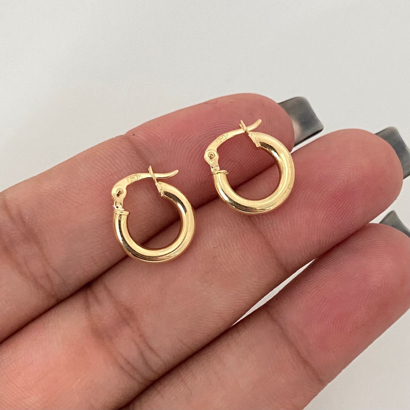 Candonga lisa troquelada Oro amarillo 18k 1,05 Gr / 1,5 Cm