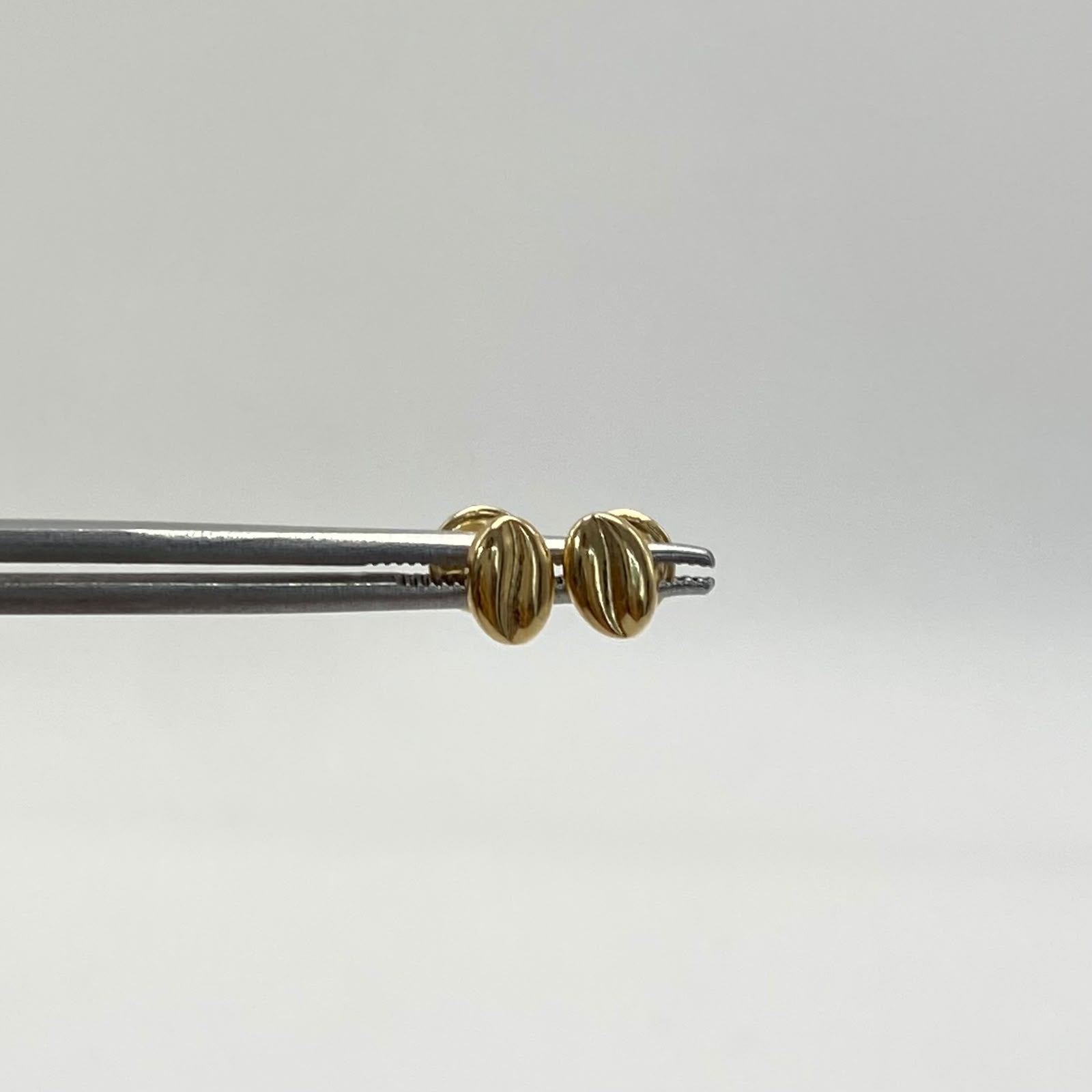 Topos grano cafe  Oro amarillo 18k 0,50 Gr / 4,3 mm