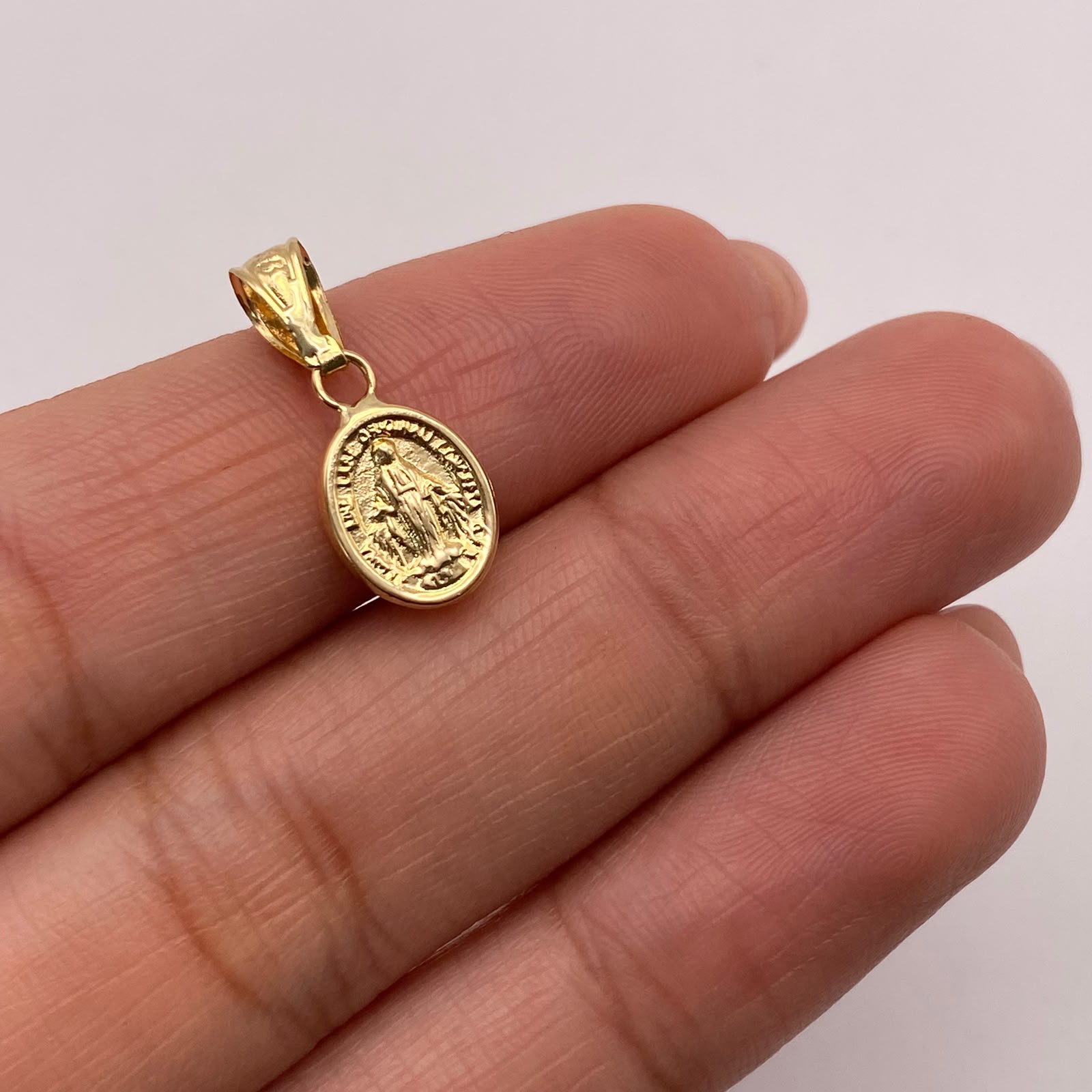 Dije Virgen milagrosa Oro amarillo 18k 0,52 Gr / 8,2 mm / 1,9 Cm