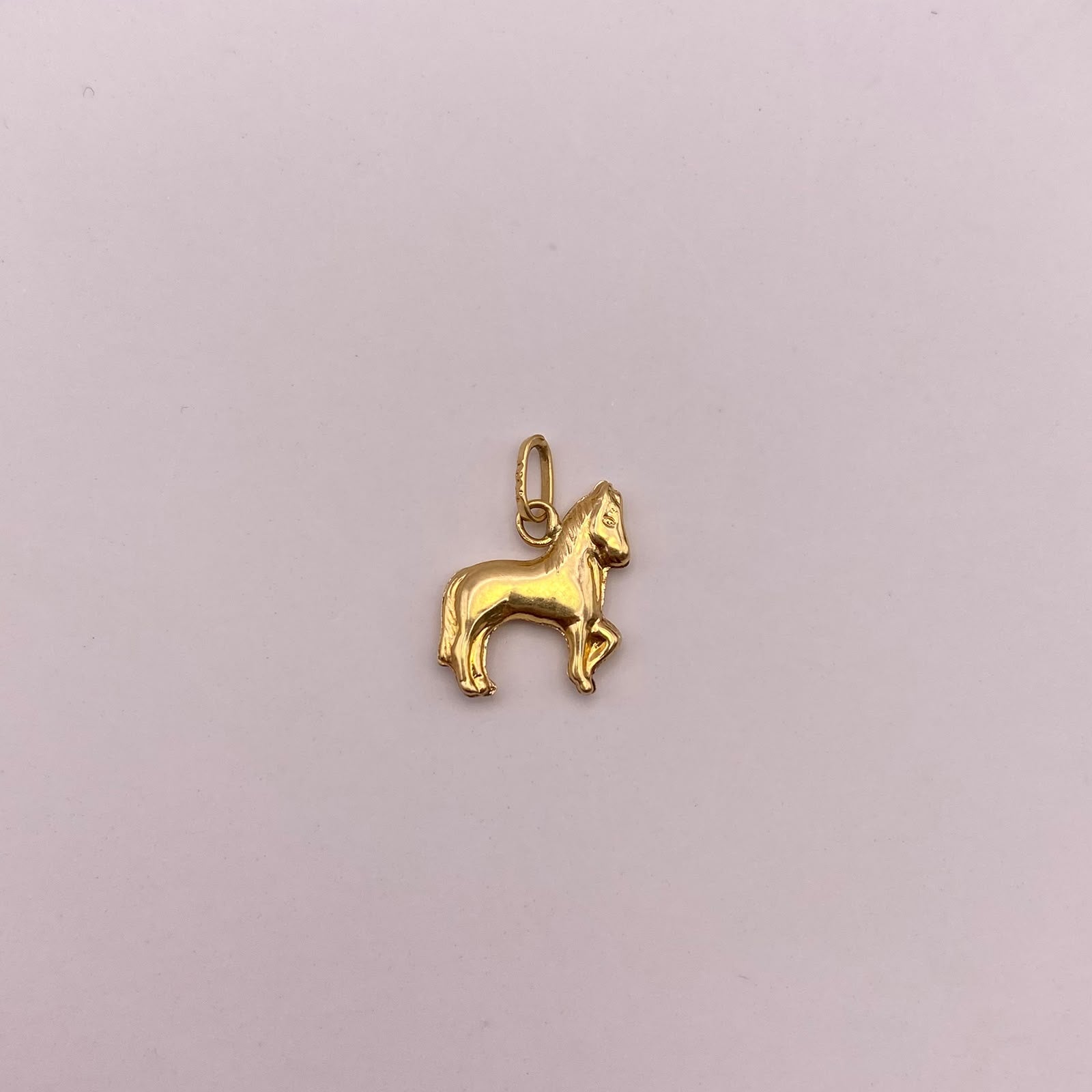Dije caballo  Oro amarillo 18k 0,6 Gr / 13,6 mm / 2,5 Cm