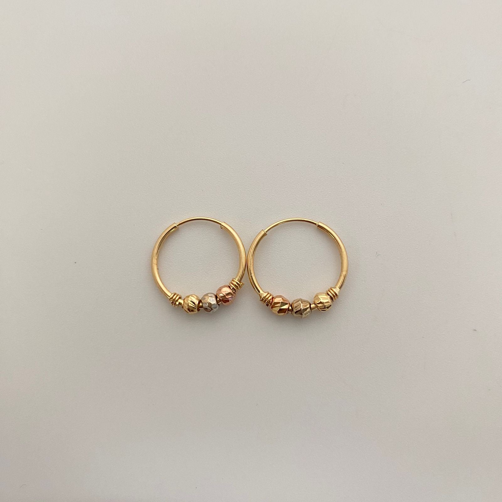 Candonga imperdible bola diamantada Tres oros 18k 1 Gr / 1,0 Cm