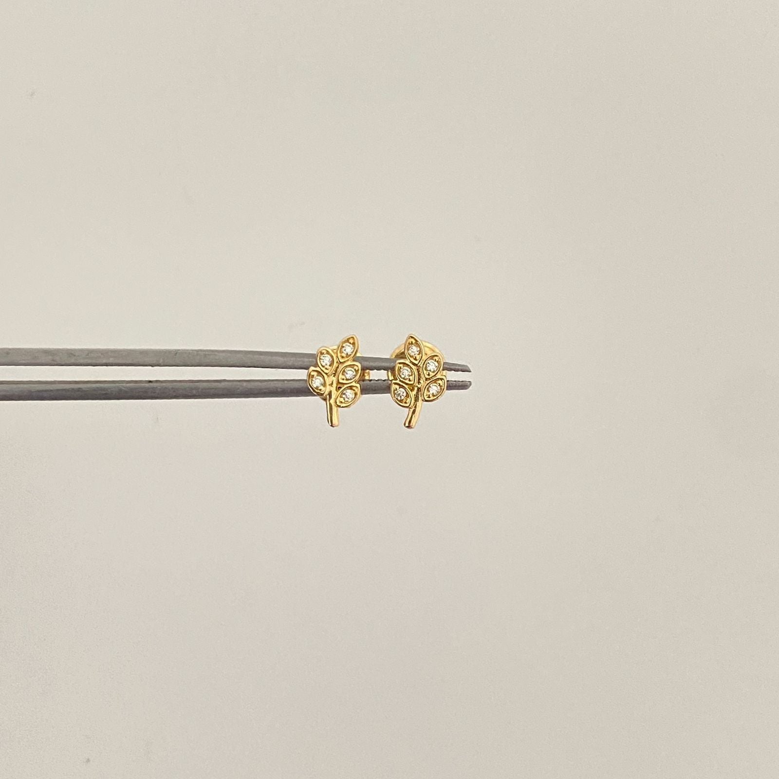 Topos hojas circones blancos Oro amarillo 18k 0,80 Gr / 4,8 mm