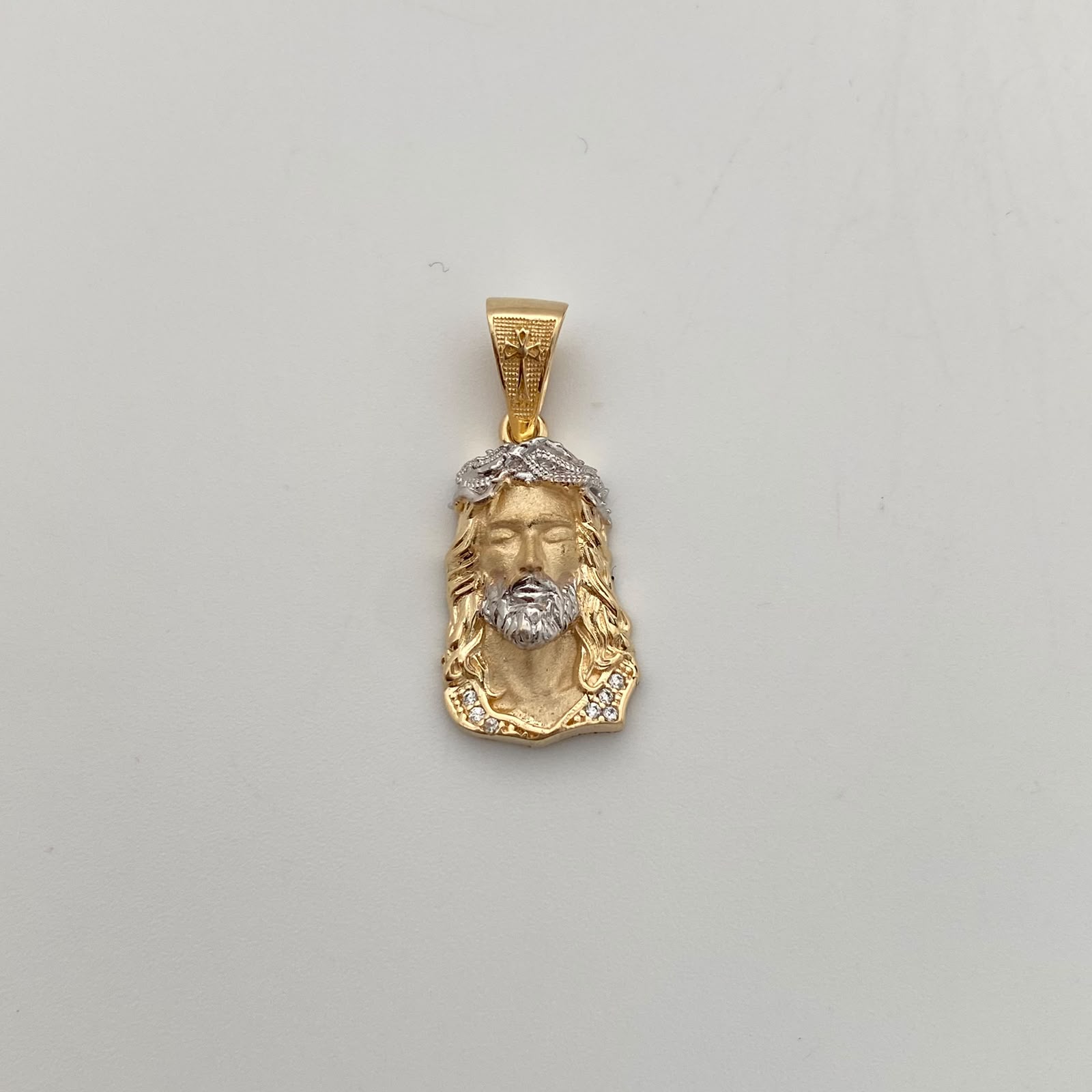 Dije Rostro Silueta Oro amarillo y Oro blanco 18k 3,55 Gr / 13 mm / 3 Cm