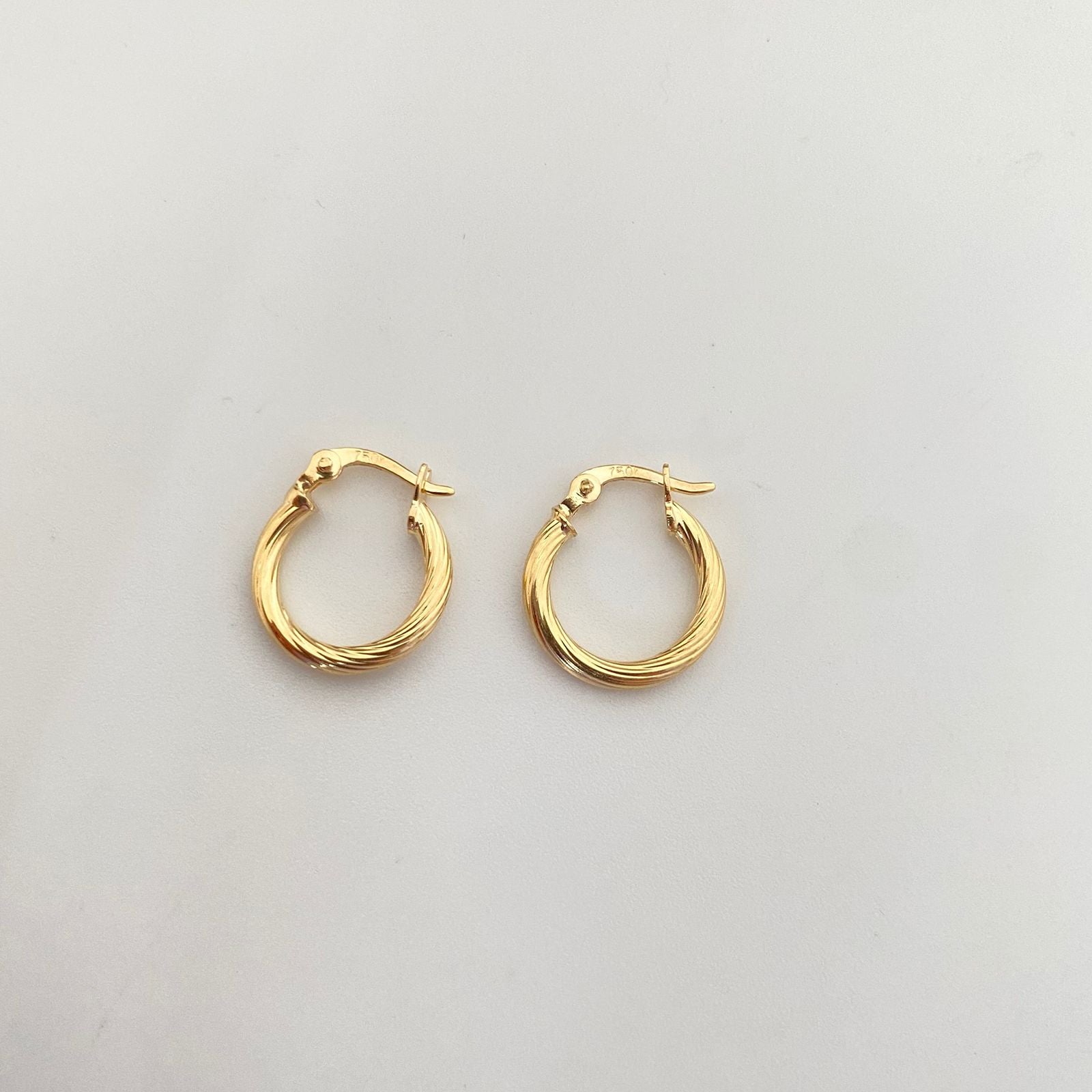 Candonga entorchada Oro amarillo 18k 1,10 Gr / 1,5 Cm