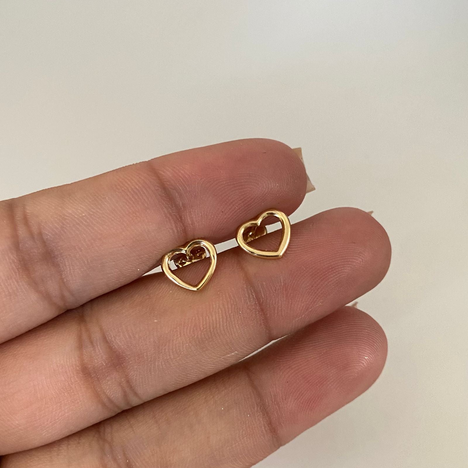 Topos silueta corazon liso Oro amarillo 18k 0,65 Gr / 8,9 mm