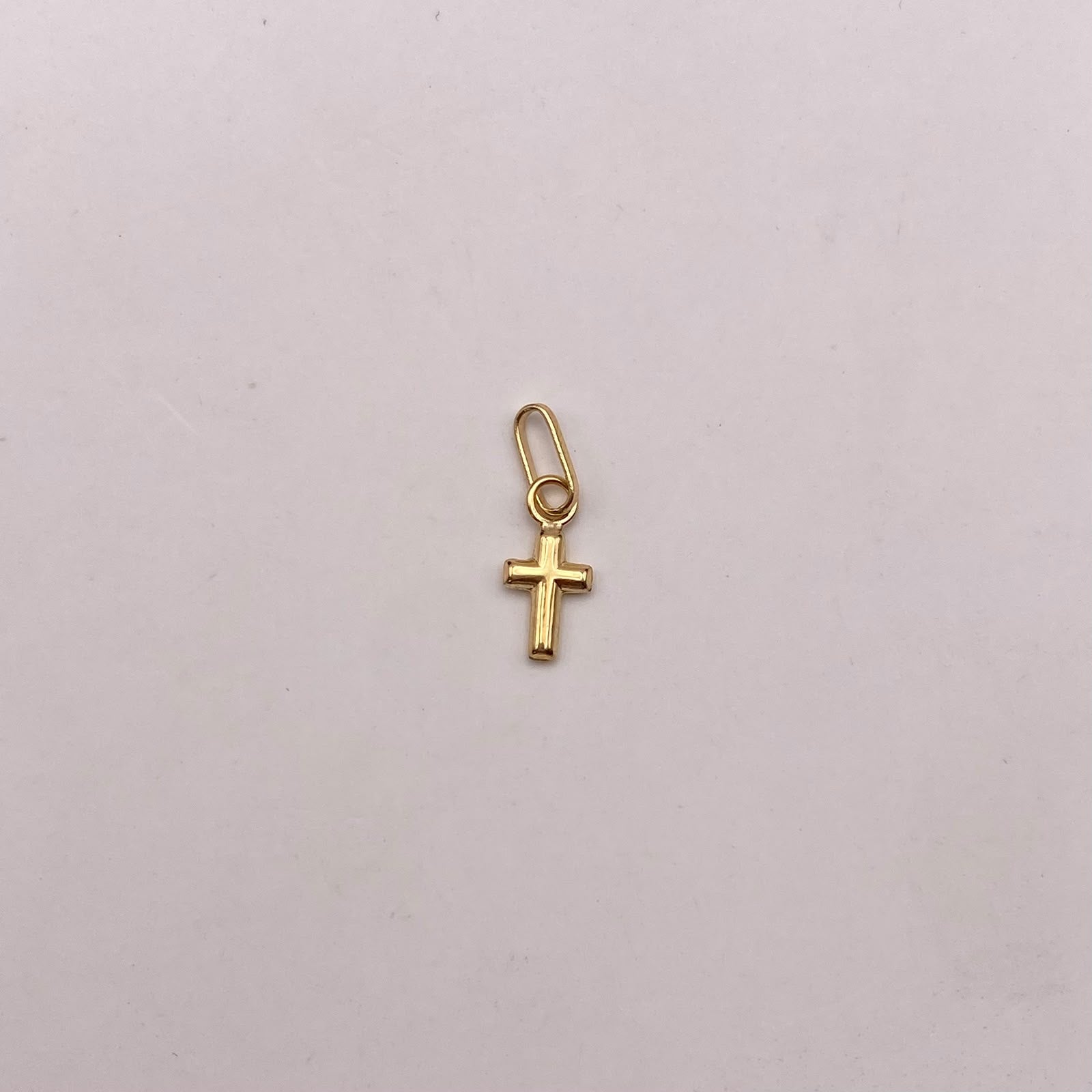Dije mini cruz lisa Oro amarillo 18k 0,25 Gr / 5,1 mm / 1,5 Cm