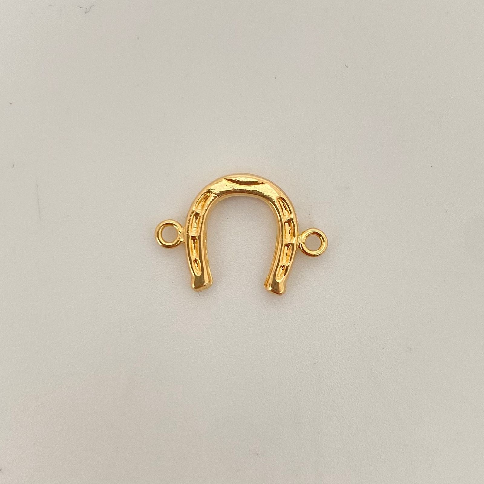 Herraje herradura Oro amarillo 18k 0,65 Gr / 1,9 Cm