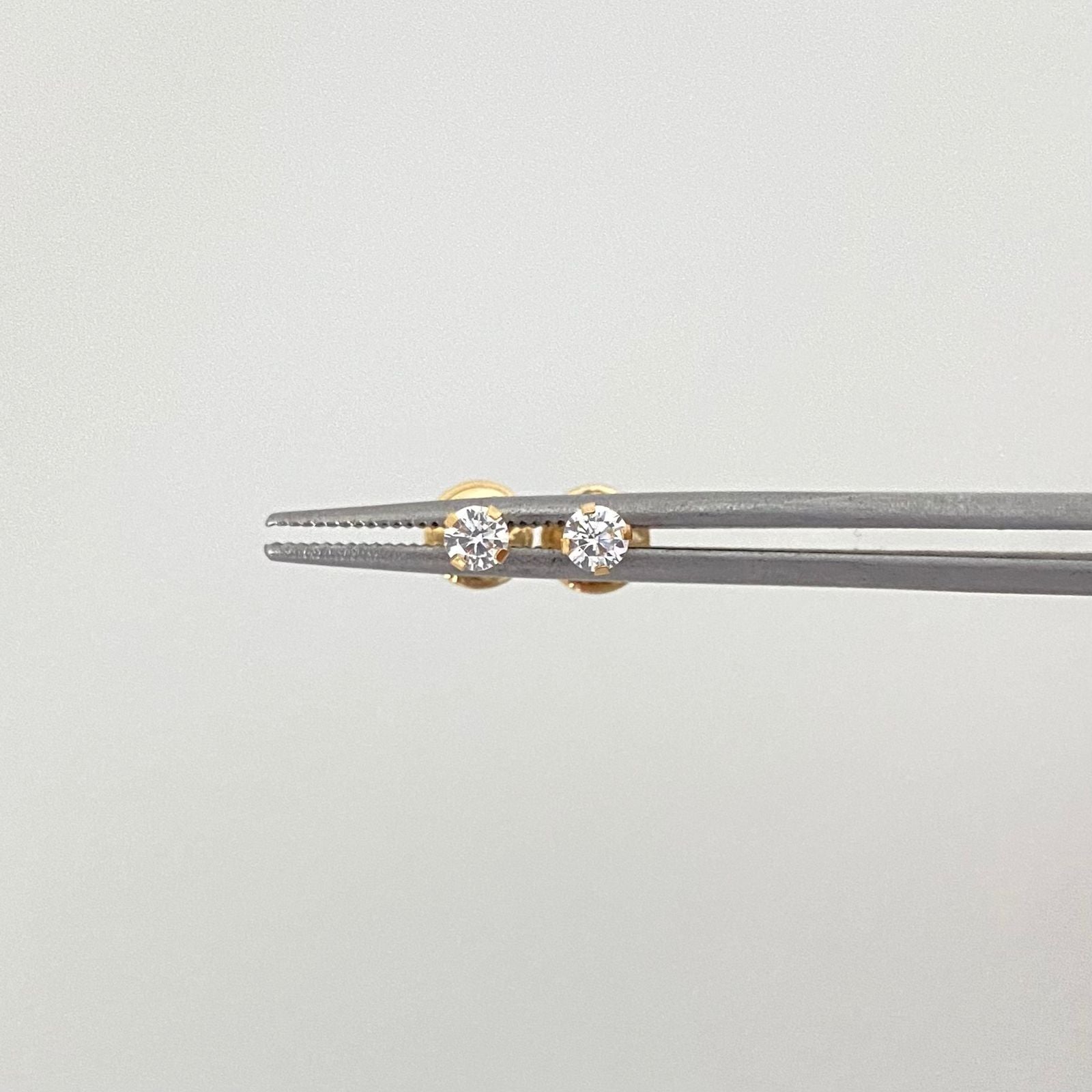 Topos circon blanco (Joya) Oro amarillo 18k 0,50 Gr / 3,0 mm