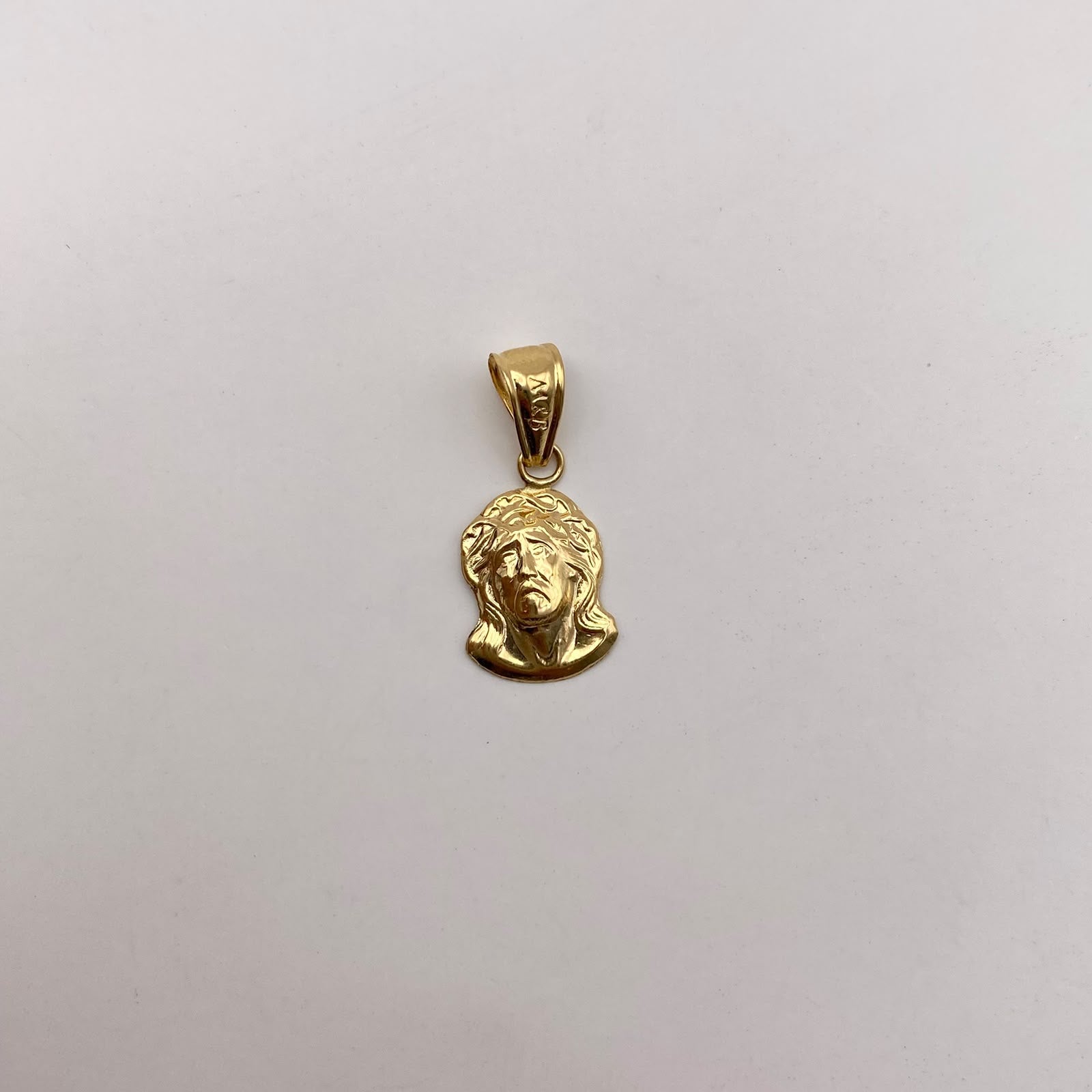 Dije rostros jesus Oro amarillo 18k 0,65 Gr / 9,3 mm / 2,5 Cm