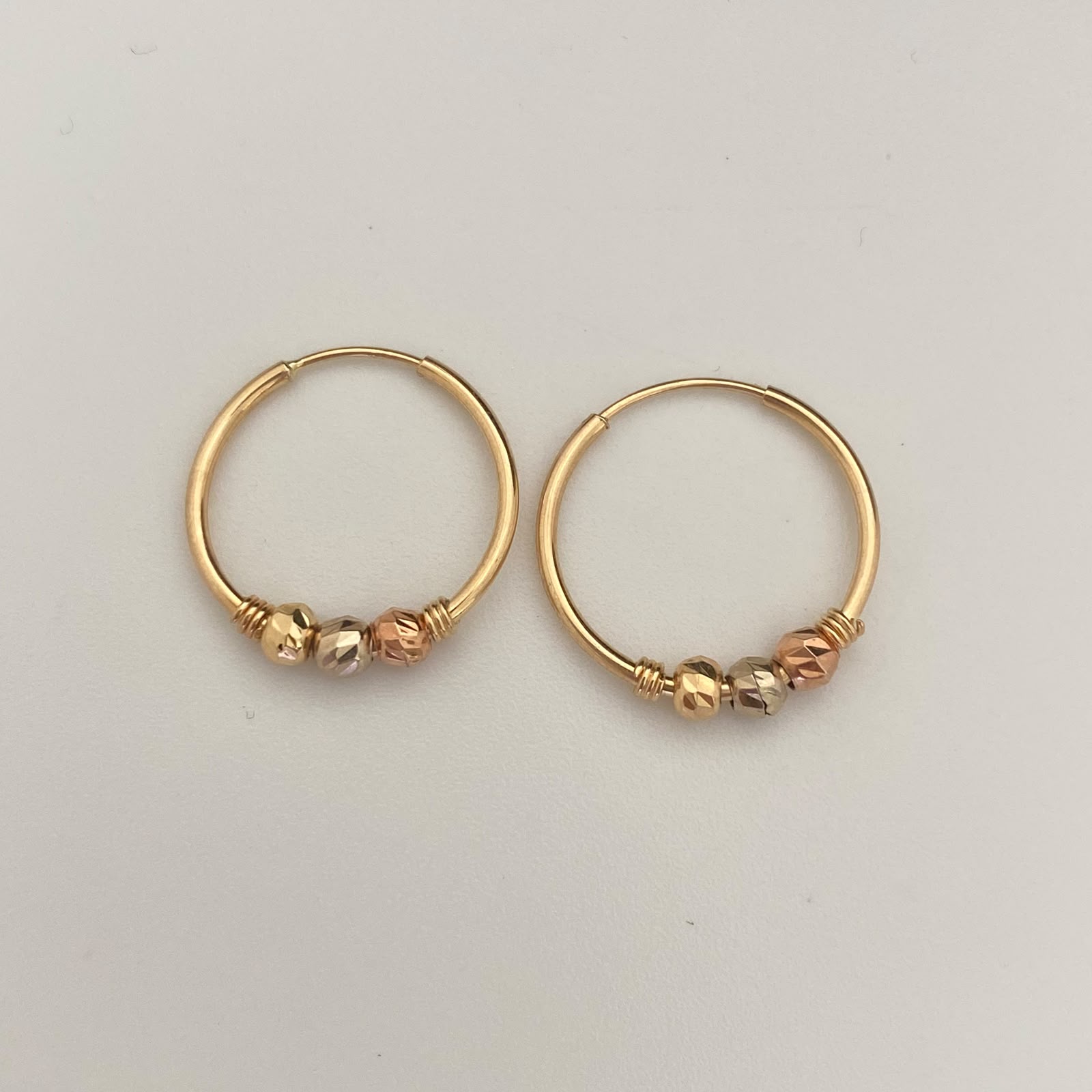 Candonga Imperdible bola diamantada Tres oros 18k 1,15 Gr / 2,6 Cm