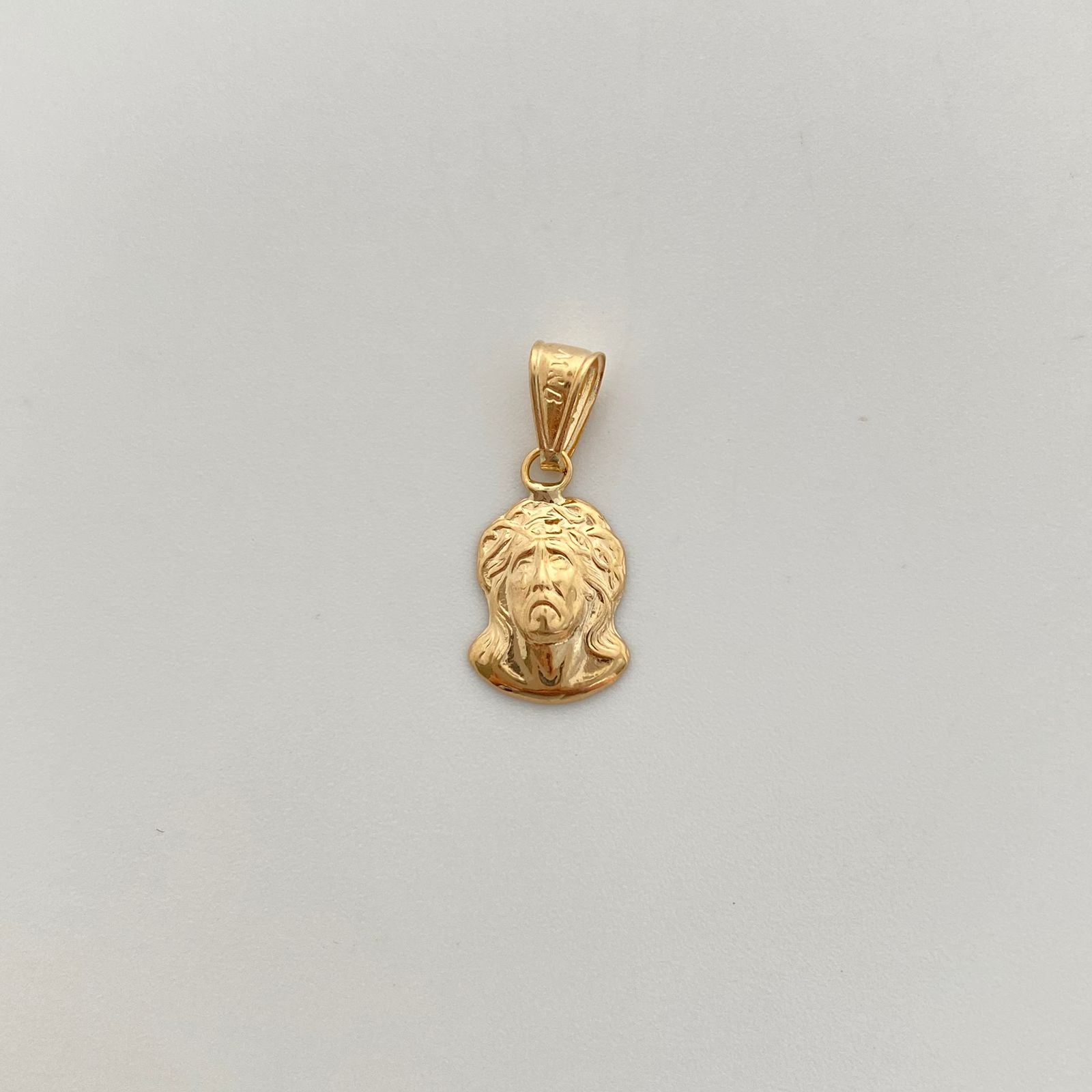 Dije rostro jesus  Oro amarillo 18k 0,65 Gr / 9,3 mm / 2,1 Cm