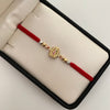 Pulsera tejida con herraje de virgen de guadalupe y balines lisos y diamantados 4mm Tres oros 18k 2,25 Gr
