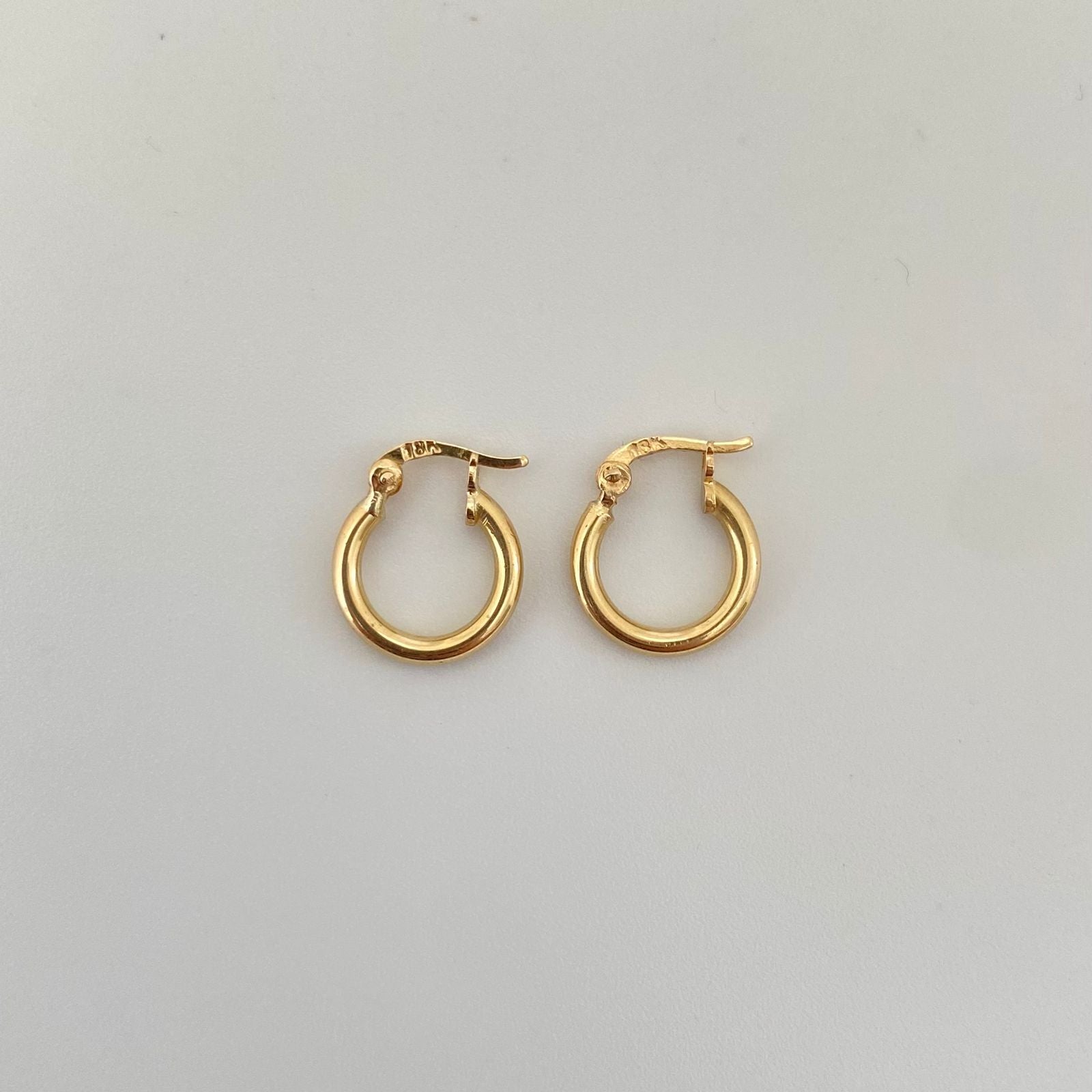 Candonga redonda lisa Oro amarillo 18k 1,1 Gr / 1,3 Cm