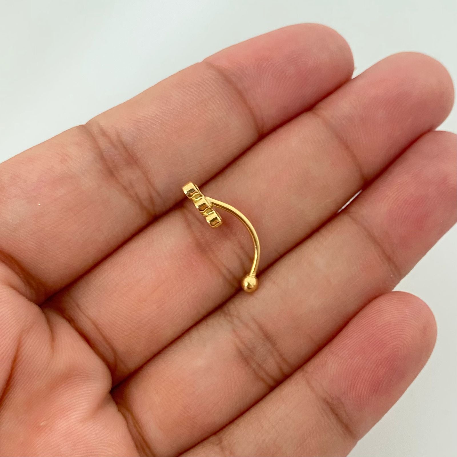 Piercing fila triple circon ( joya ) Oro amarillo 18k 0,8 Gr
