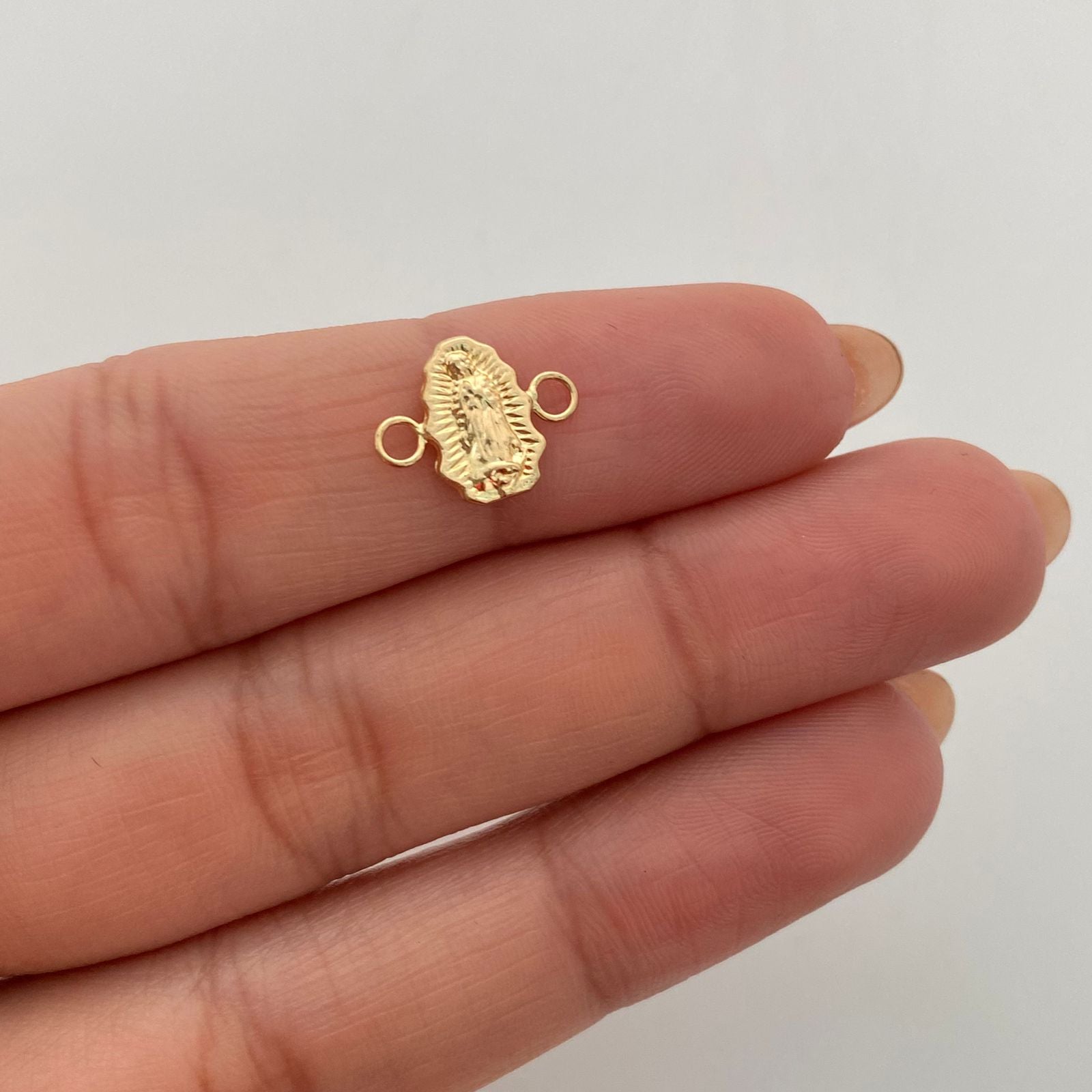 Herraje Guadalupe silueta Oro amarillo 18k 0,35 Gr / 1 Cm