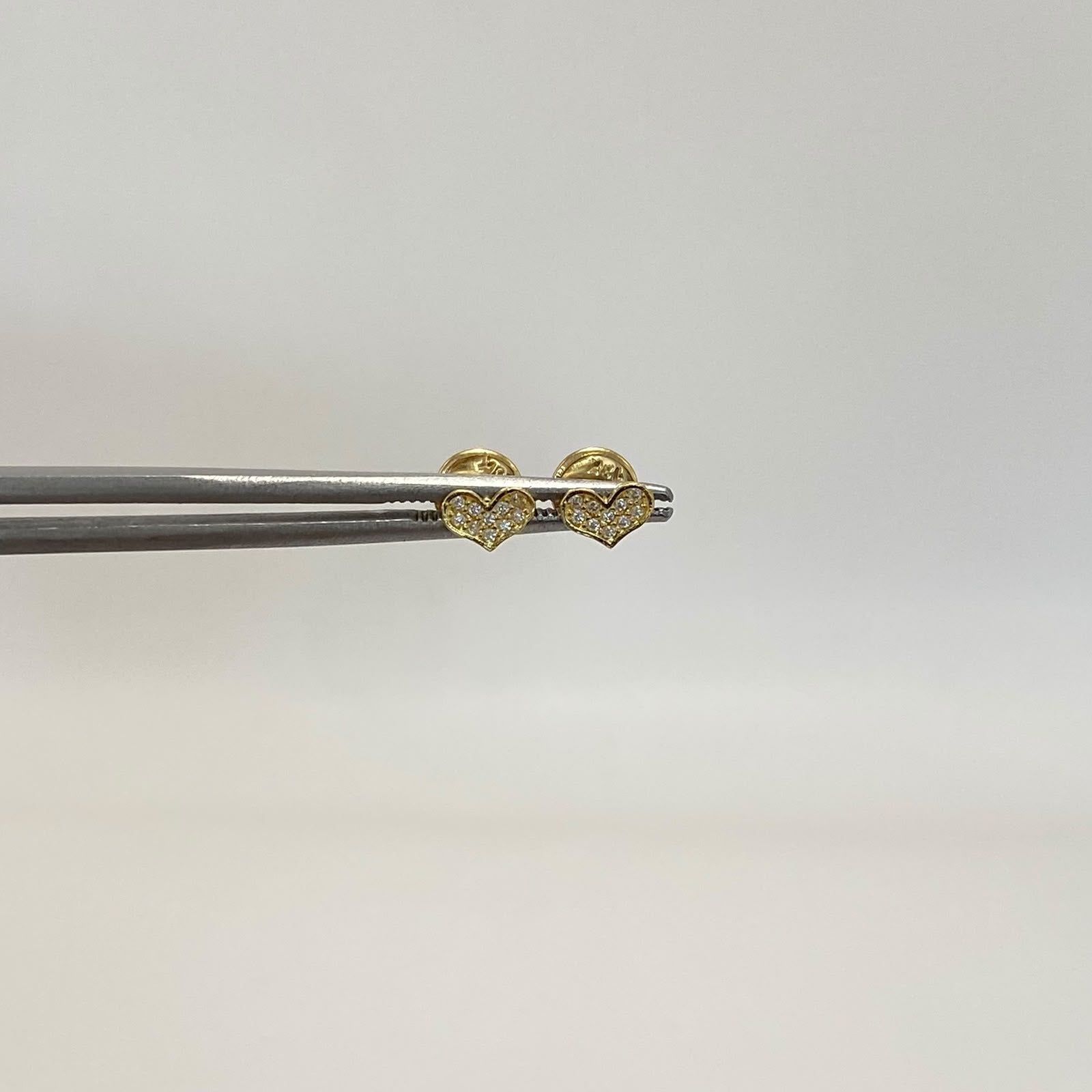 Topos corazon circones blancos Oro amarillo 18k 0,6 Gr / 5,5 mm