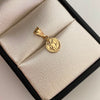 Dije San Benito Oro amarillo 18k 0,4 Gr / 8,5 mm / 1,6 Cm