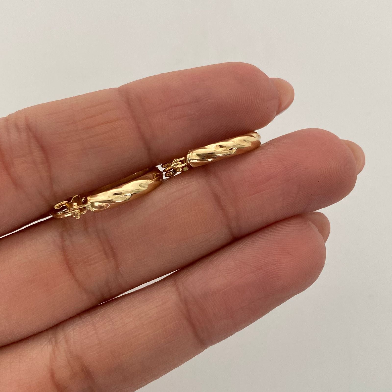 Candonga Ovalada diamantada Oro amarillo 18k 1,2 Gr / 1,8 Cm