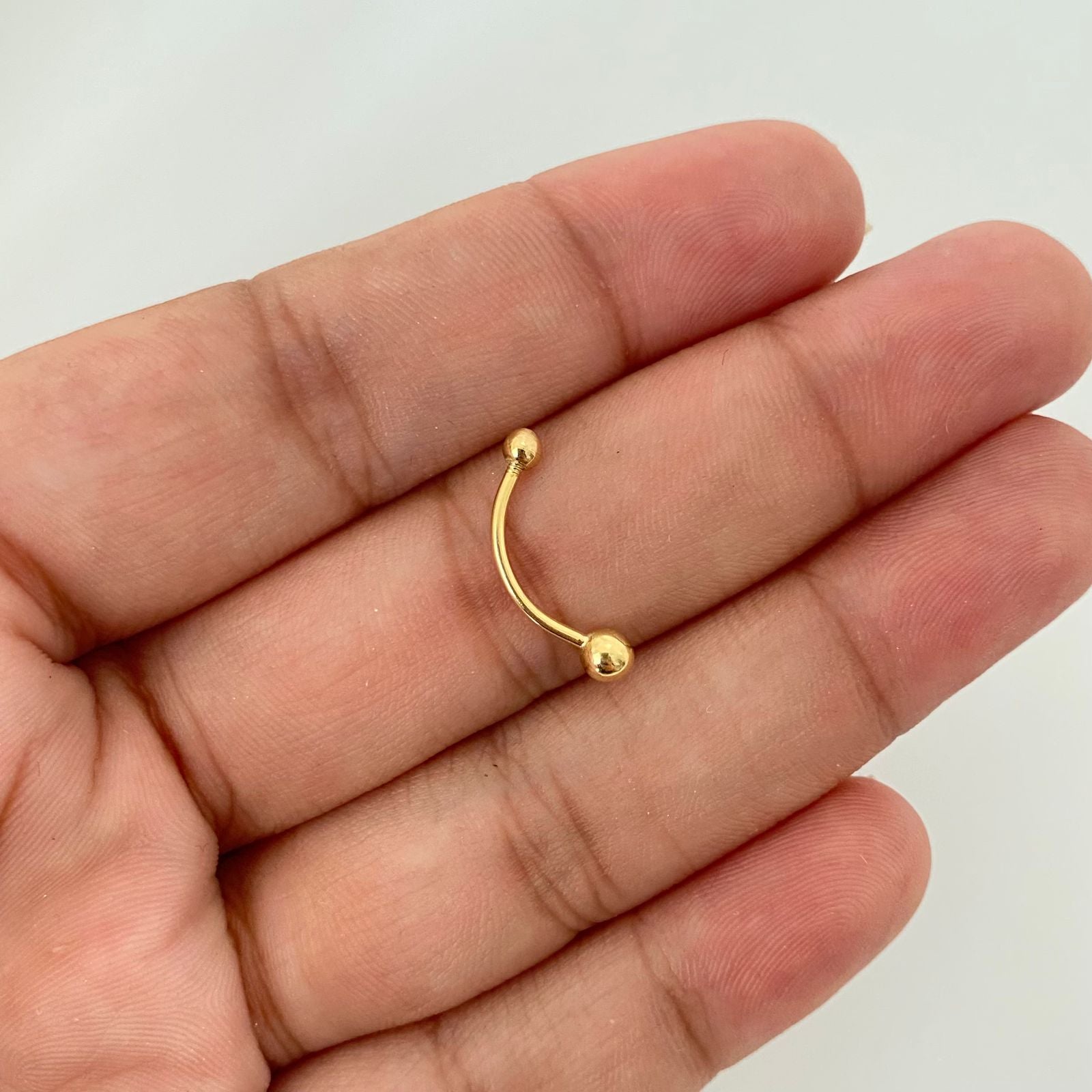 Piercing bola lisa ( joya ) Oro amarillo 18k 0,8 Gr