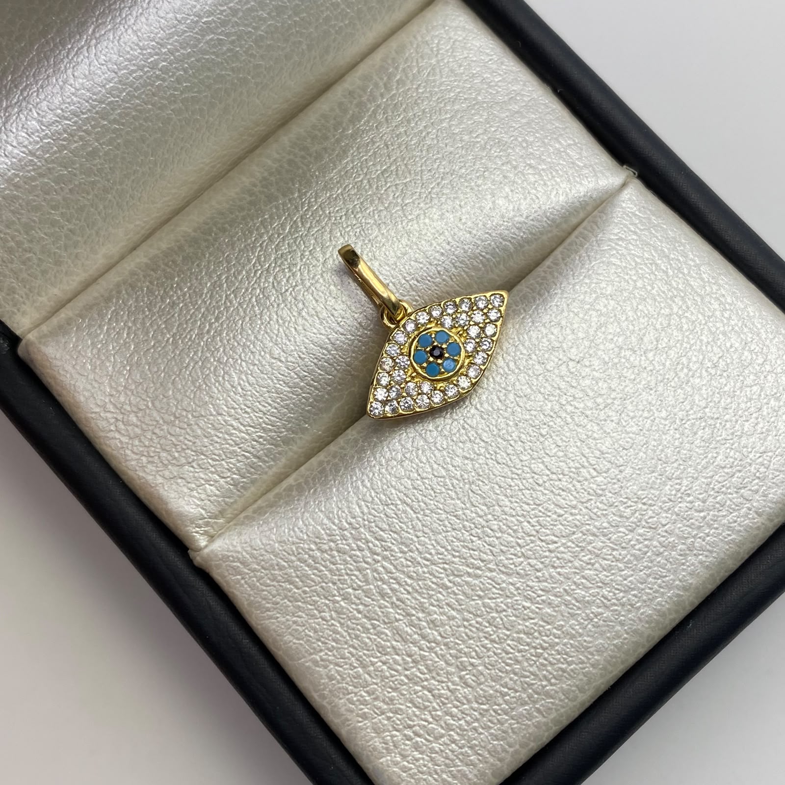 Dije Ojo turco casting Oro amarillo 18k 1,1 Gr / 13,4 mm / 1,4 Cm