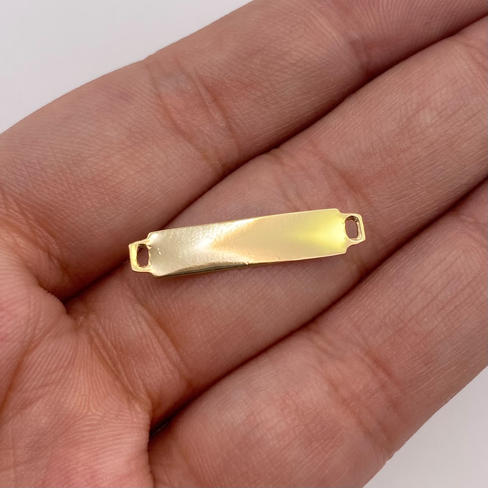 Herraje placa lisa Oro amarillo 18k 0,38 Gr / 2,4 Cm