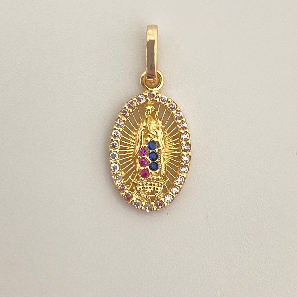 Dije mini silueta virgen guadalupe casting colores ovalada Oro amarillo 18k 1,25 Gr / 2,2 Cm