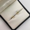 Topos Doble corazon Oro amarillo 18k 0,7 Gr / 7,4 mm