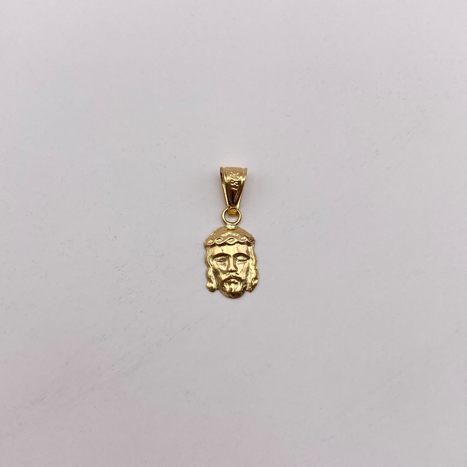 Dije rostro jesus Oro amarillo 18k 0,55 Gr / 7,8 mm / 2 Cm