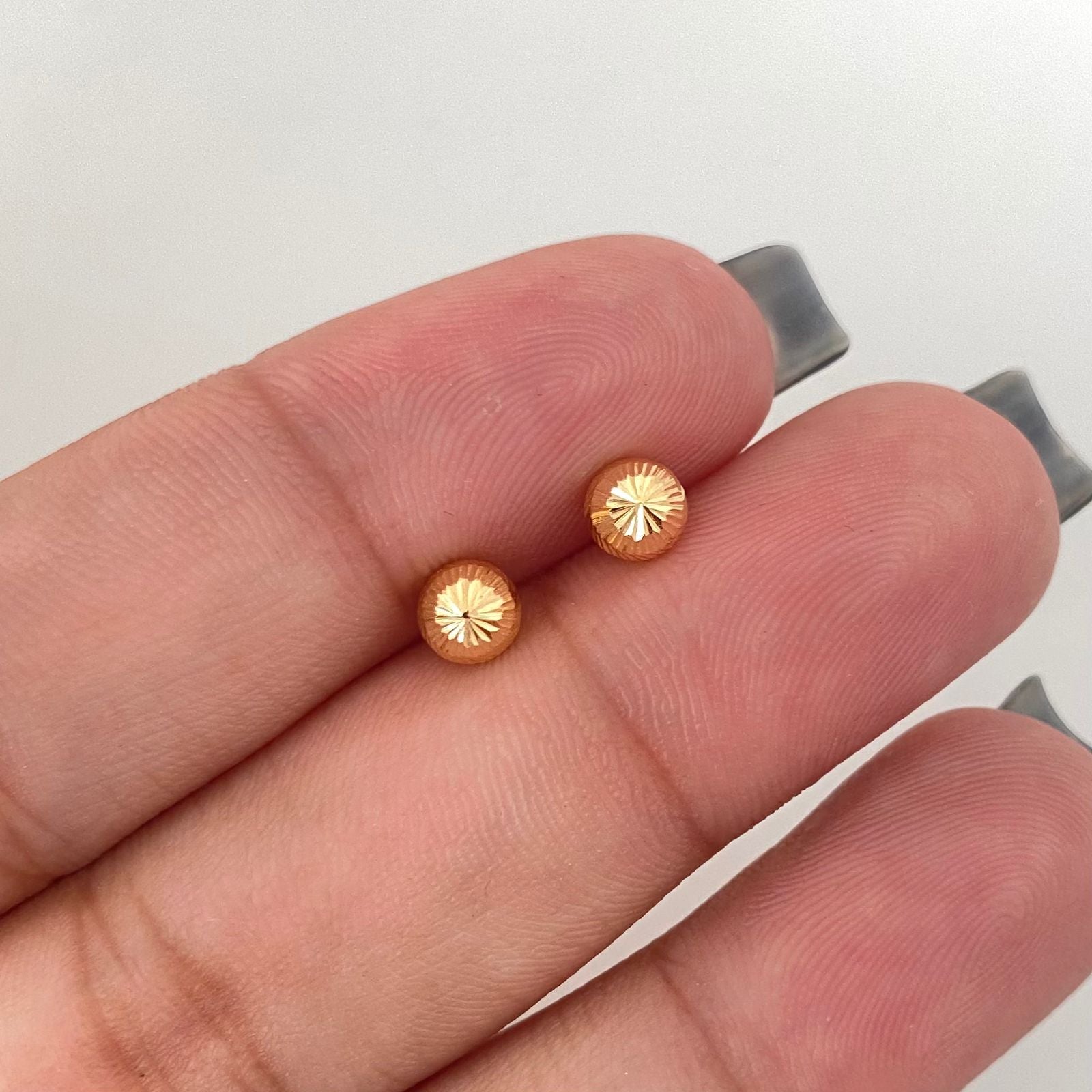 Topos bola diamantada Oro amarillo 18k 0,60 Gr / 5,0 mm