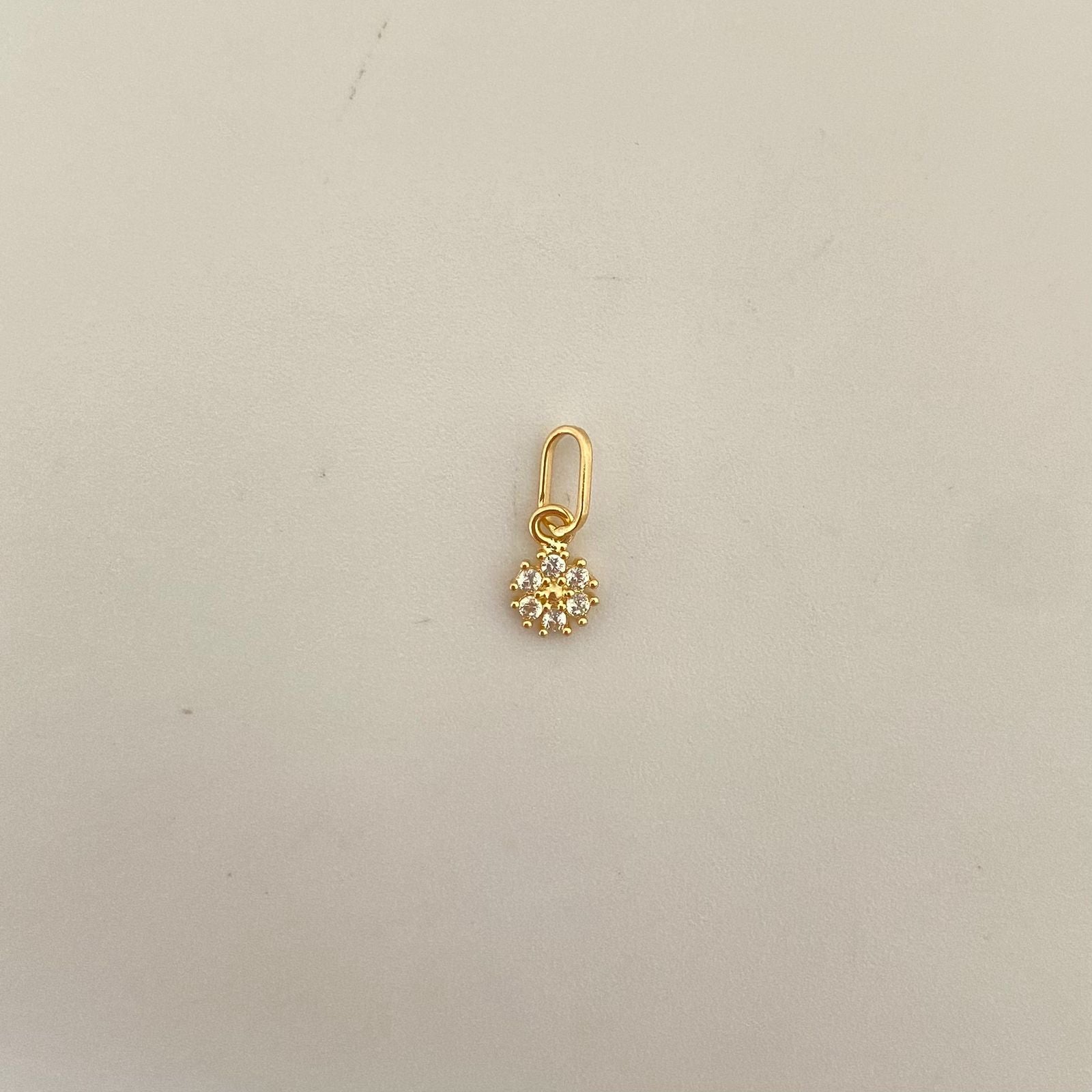 Dije mini flor casting Oro amarillo 18k 0,25 Gr / 1,2 Cm