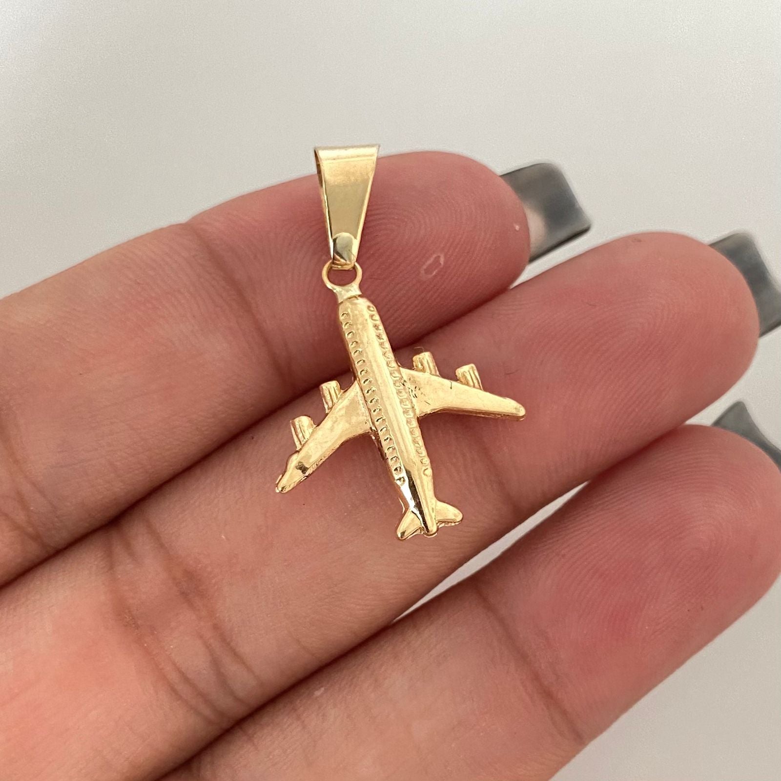 Dije avión Oro amarillo 18k 0,9 Gr / 3,0 Cm