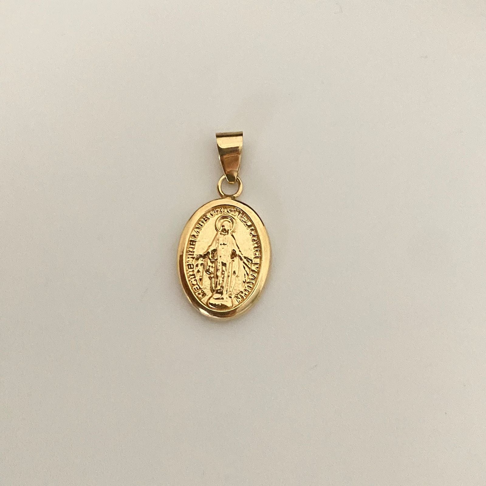 Dije virgen milagrosa Oro amarillo 18k 0,95 Gr / 2,2 Cm