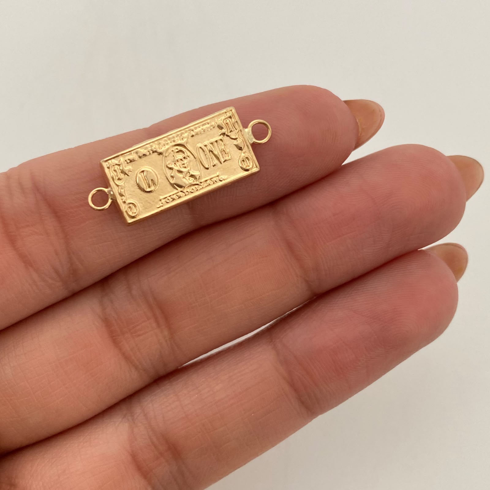 Herraje Dolar Oro amarillo 18k 1,05 Gr / 2,5 Cm